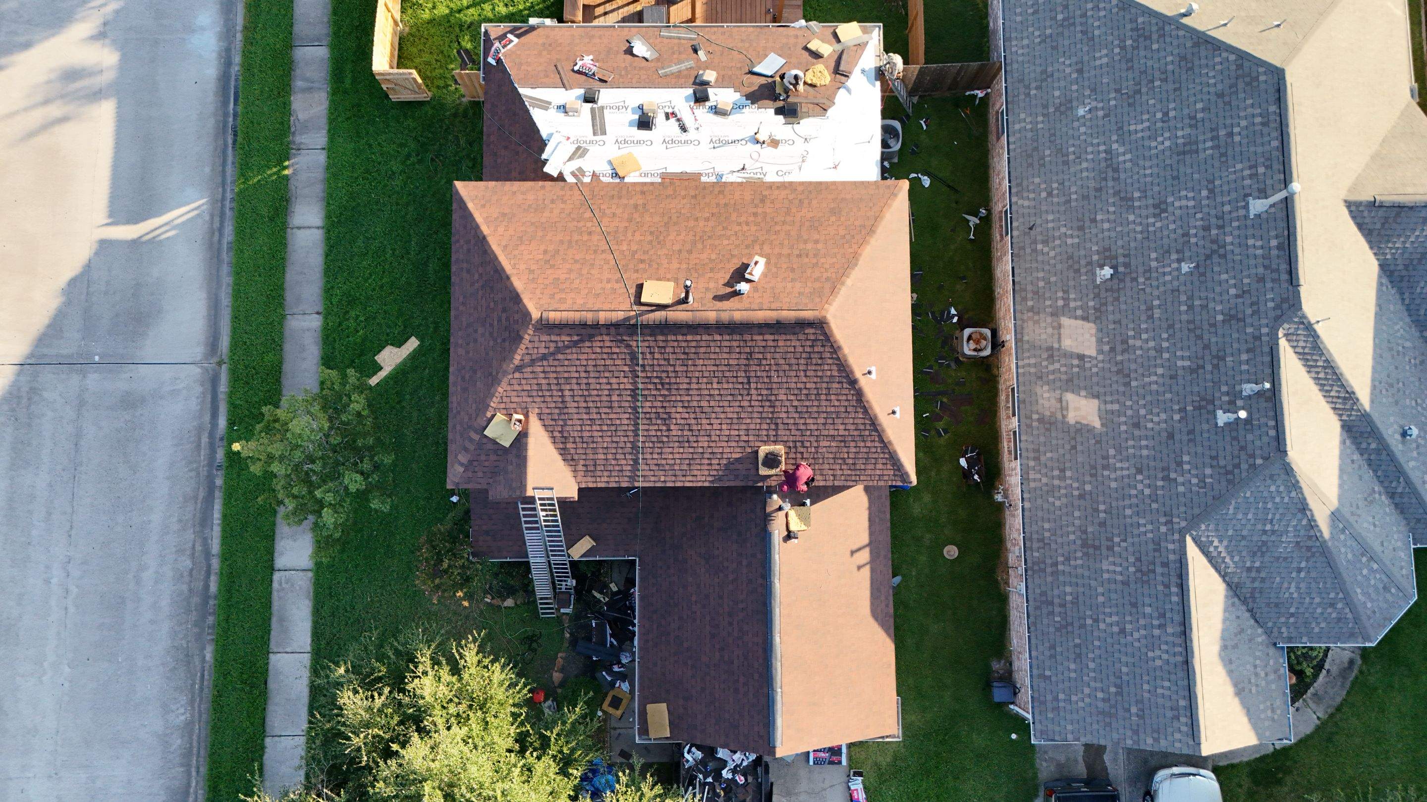 Full Roof Replacement in Warm Brown Tones — Spring, TX by PL Roofing & SB Roofing, LLC.