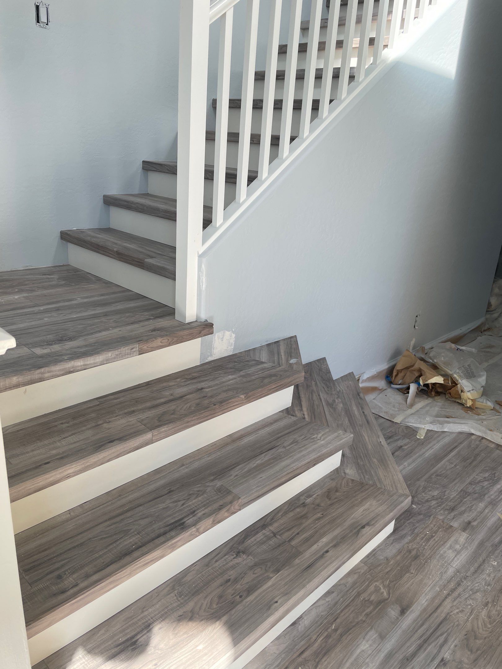 Laminate Staircase and Flooring  by Footprints Floors of Chandler 