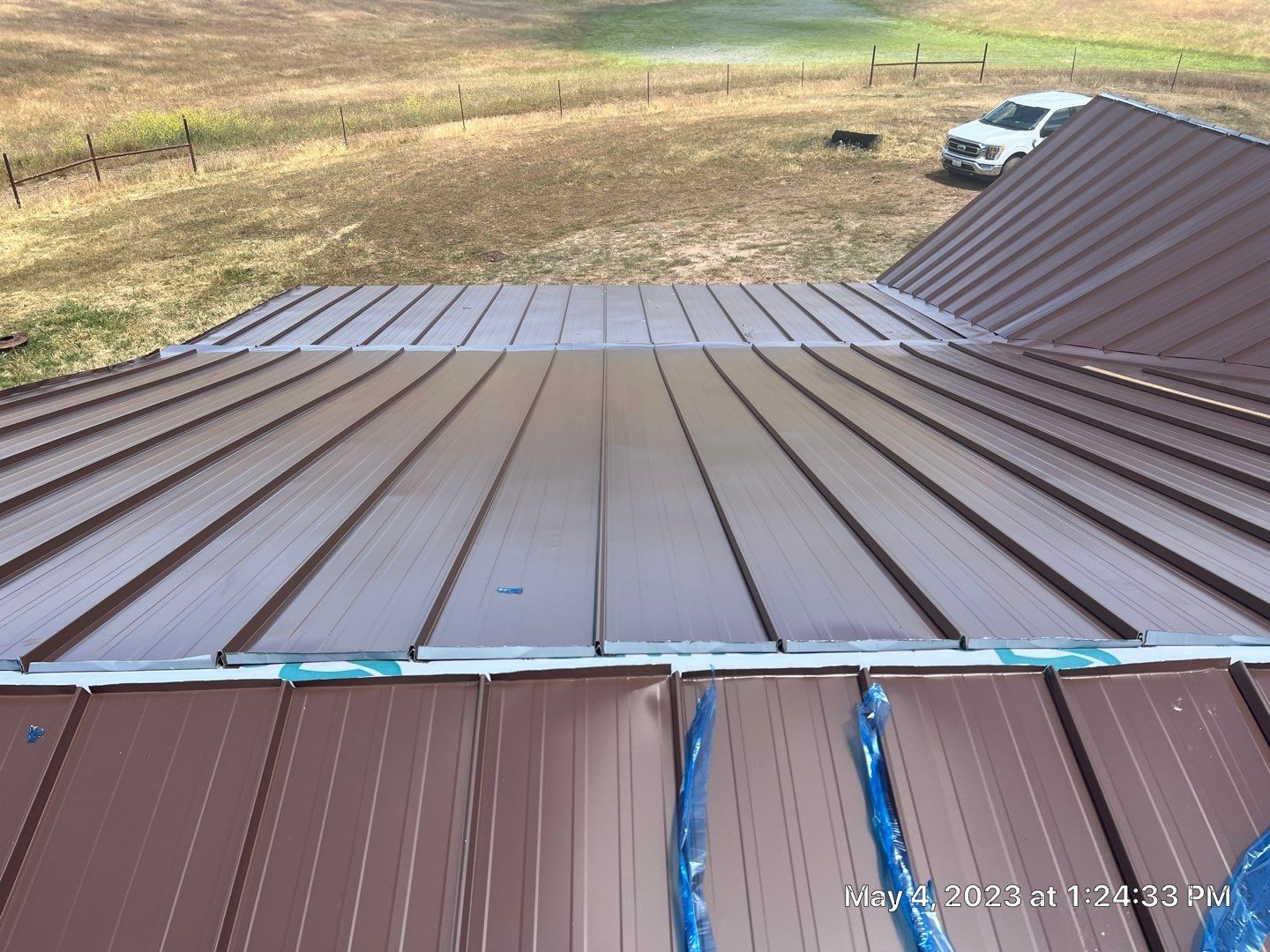 Metal roofing installation using Standing seam metal roofing system by Straight Edge Roofing Inc