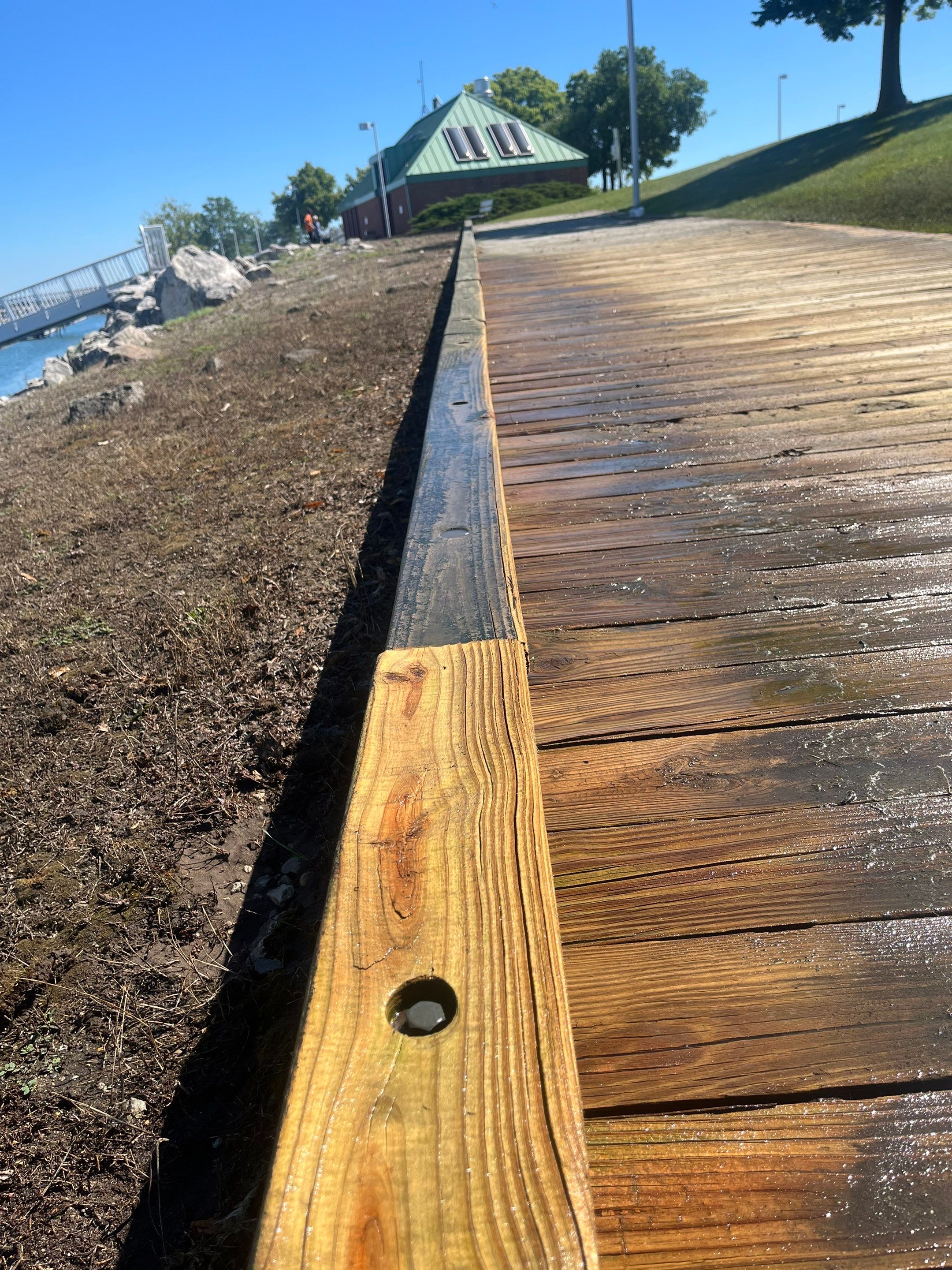 wood promenade cleaning by Northern Power Washing LLC.
