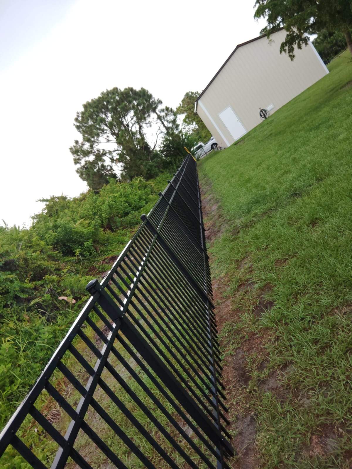 Black Aluminum Picket Fence Installation for Port Charlotte Residence by True Fence LLC