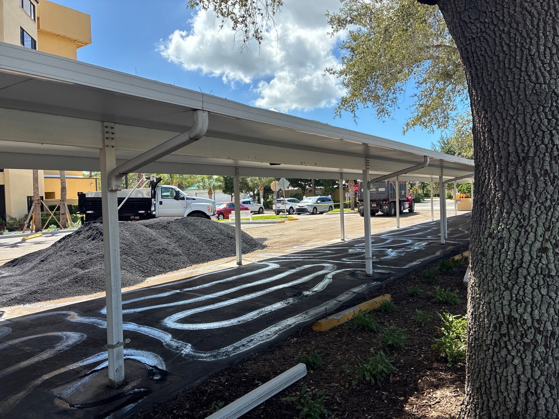 Comprehensive Parking Lot Mill and Overlay with Custom Line Striping in Venice by Everline Coatings & Services - Southwest FL