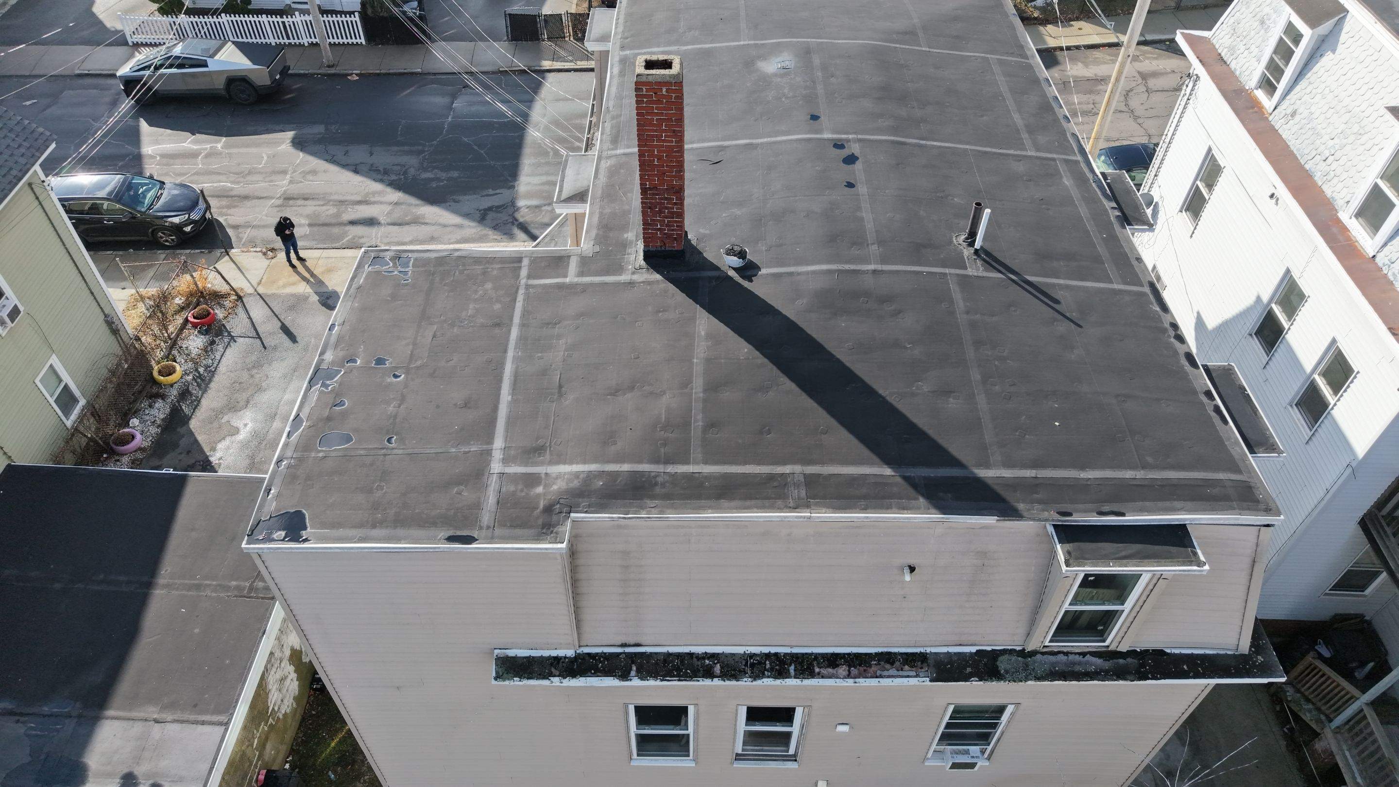 Gravel Roof Tear-Off & EPDM Rubber Roof Conversion in Haverhill, MA by JOHNNYS PRO