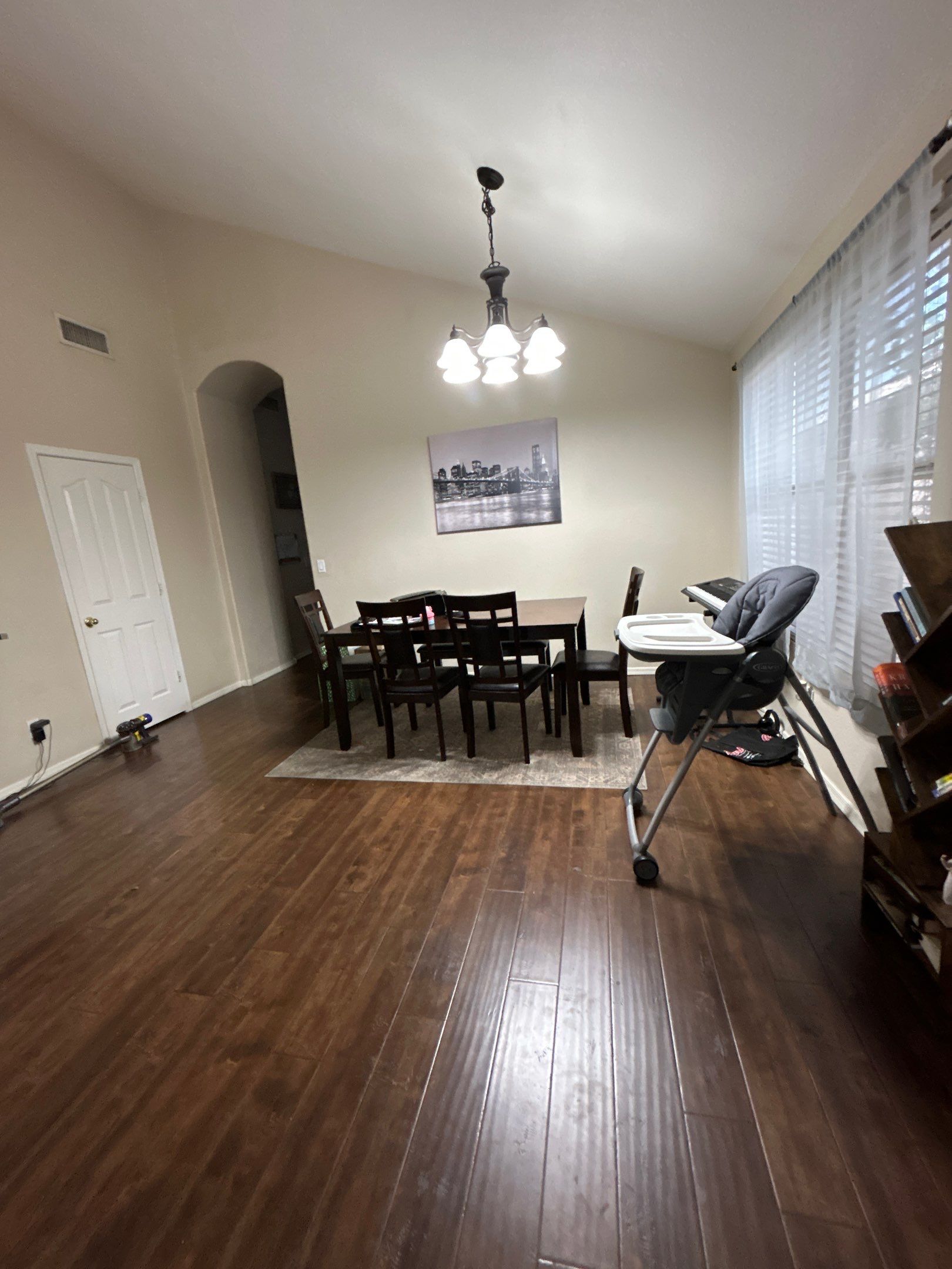 Dark Wood Laminate Flooring Installation for Chandler Dining Room by CompanyCam Sales Demo