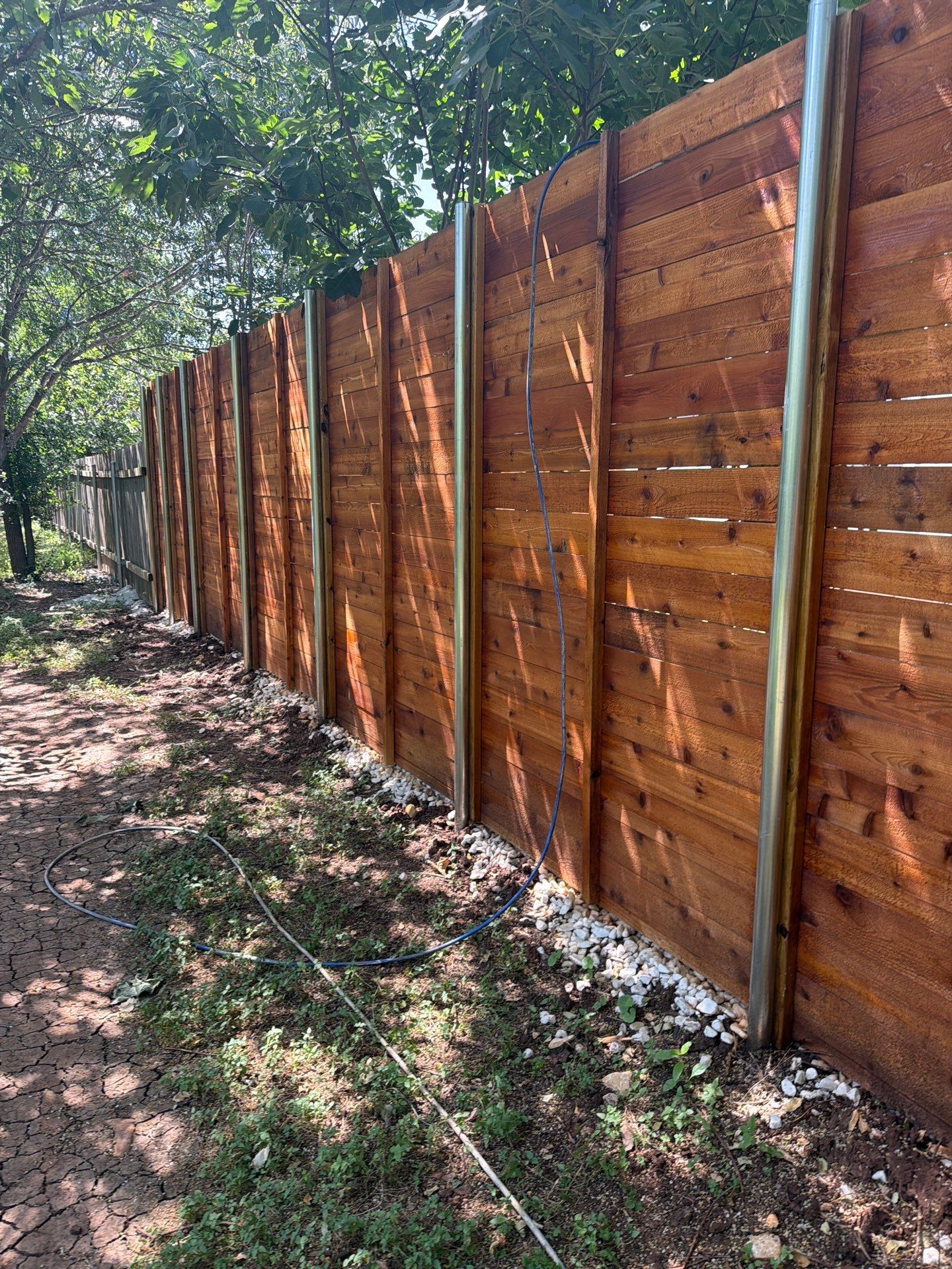 Custom Horizontal Cedar Privacy Fence and Gate Installation in Austin by Rhino Home Care