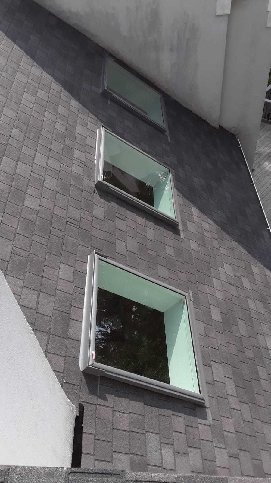 Skylight, Roof, and Gutter Replacement by American Home Contractors