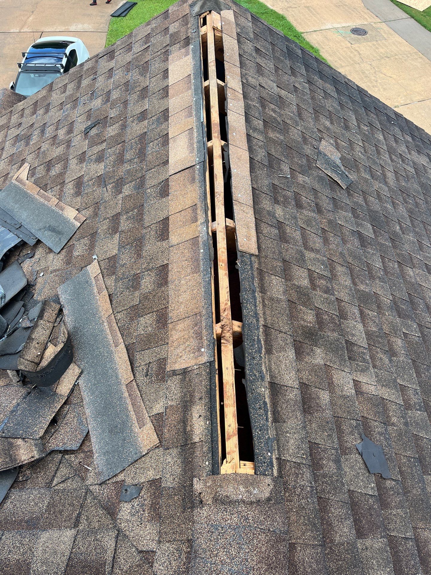 Hail Damage using Owen's Corning Duration (Lifetime) Shingles by Roof Repair Company