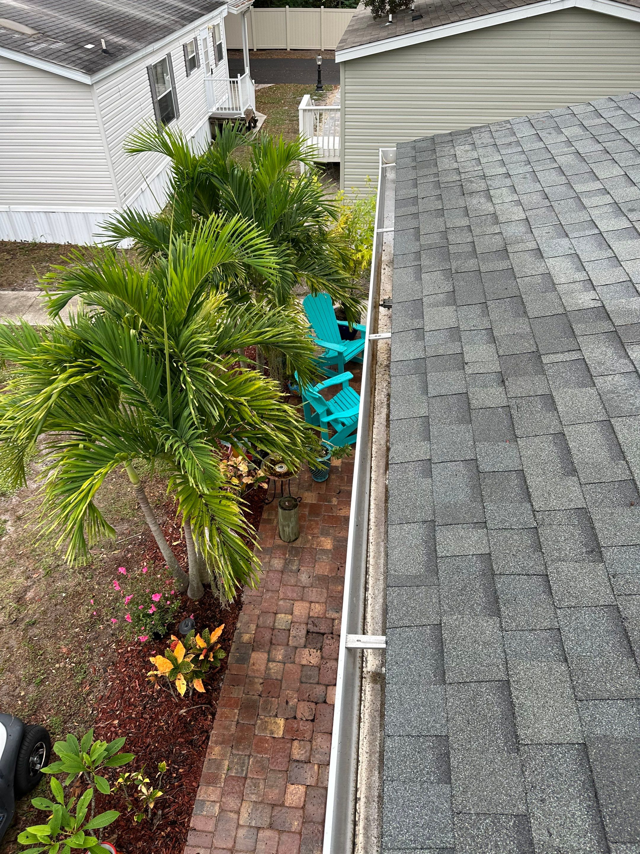 Gutter Cleaning and House Washing Services  by Sunshine AquaWash
