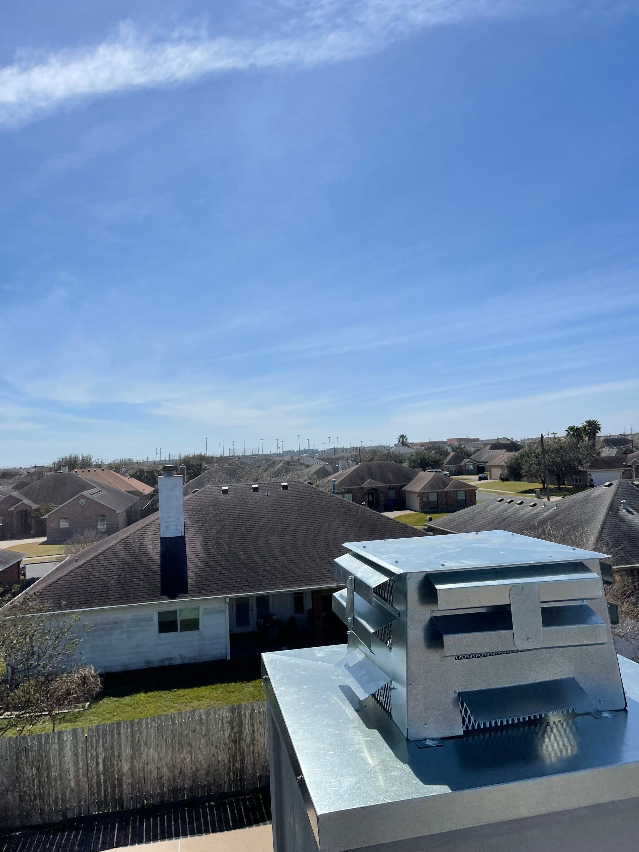 Residential Roofing Repair Replacing Chimney Cap by Lighthouse Roofing