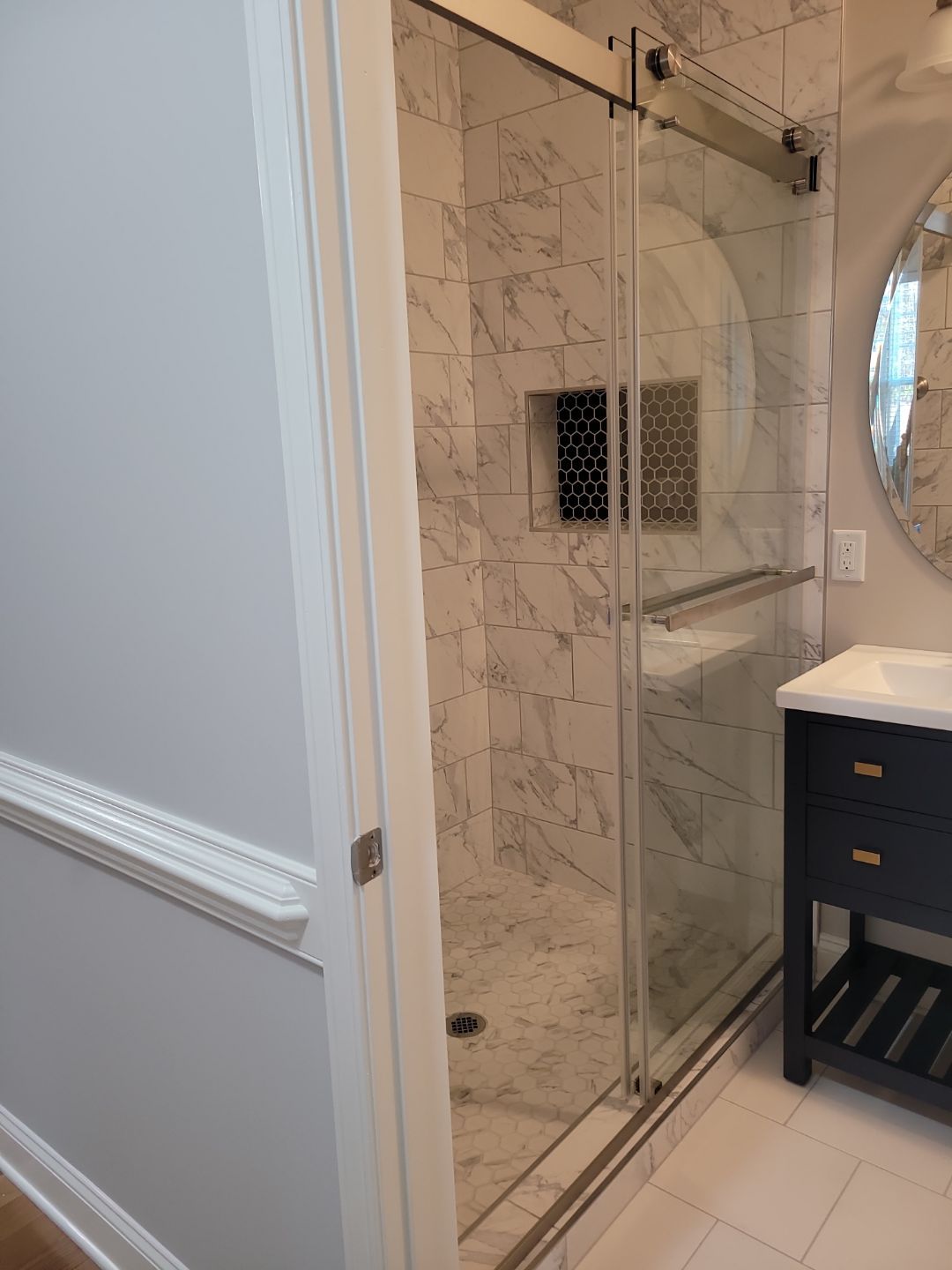 A Pathway to Possibility – Turning a Half Bath into a Full Retreat in Holly Springs by Elite Remodeling and Design LLC