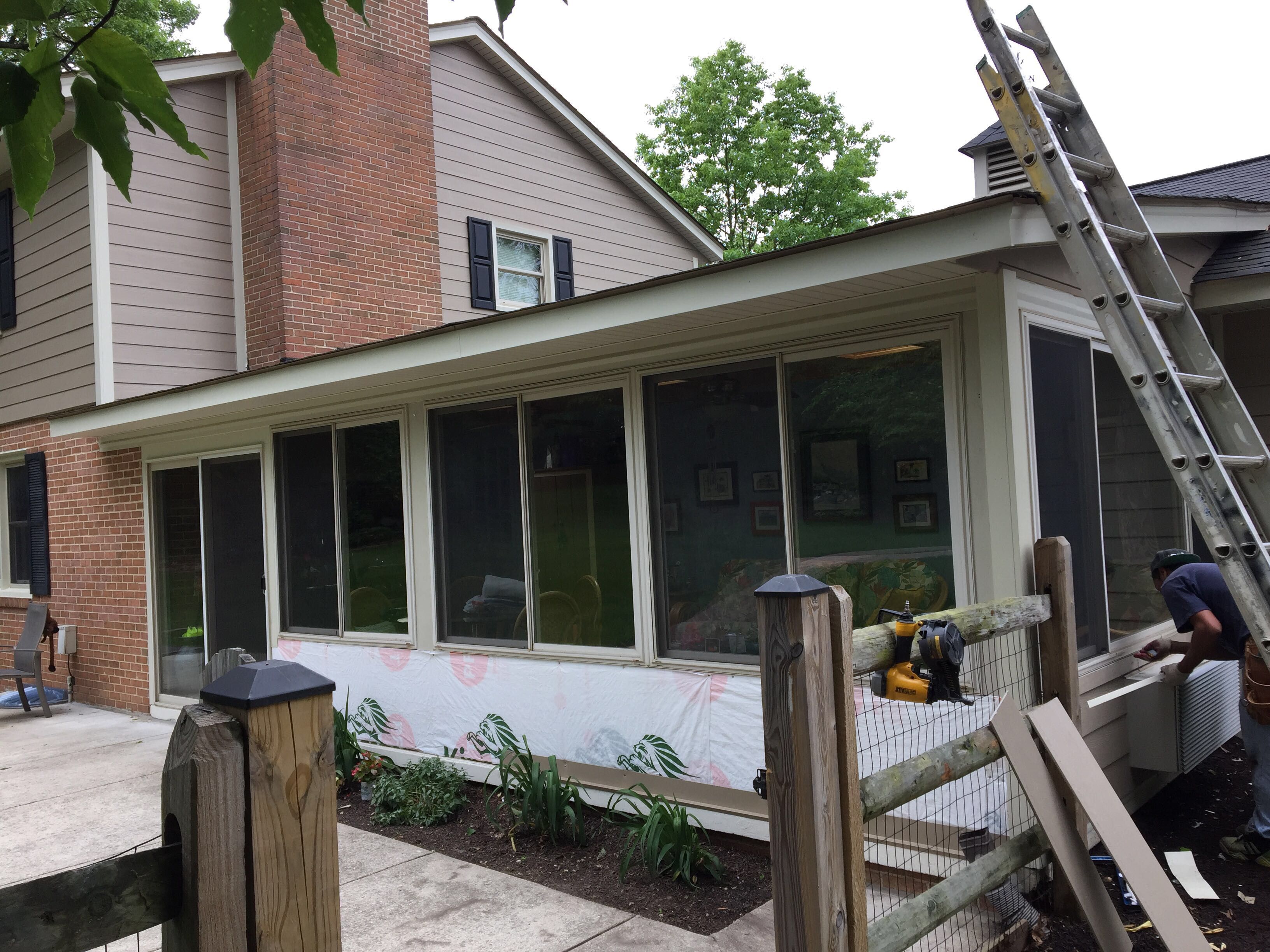 Siding and Roof Replacement by American Home Contractors