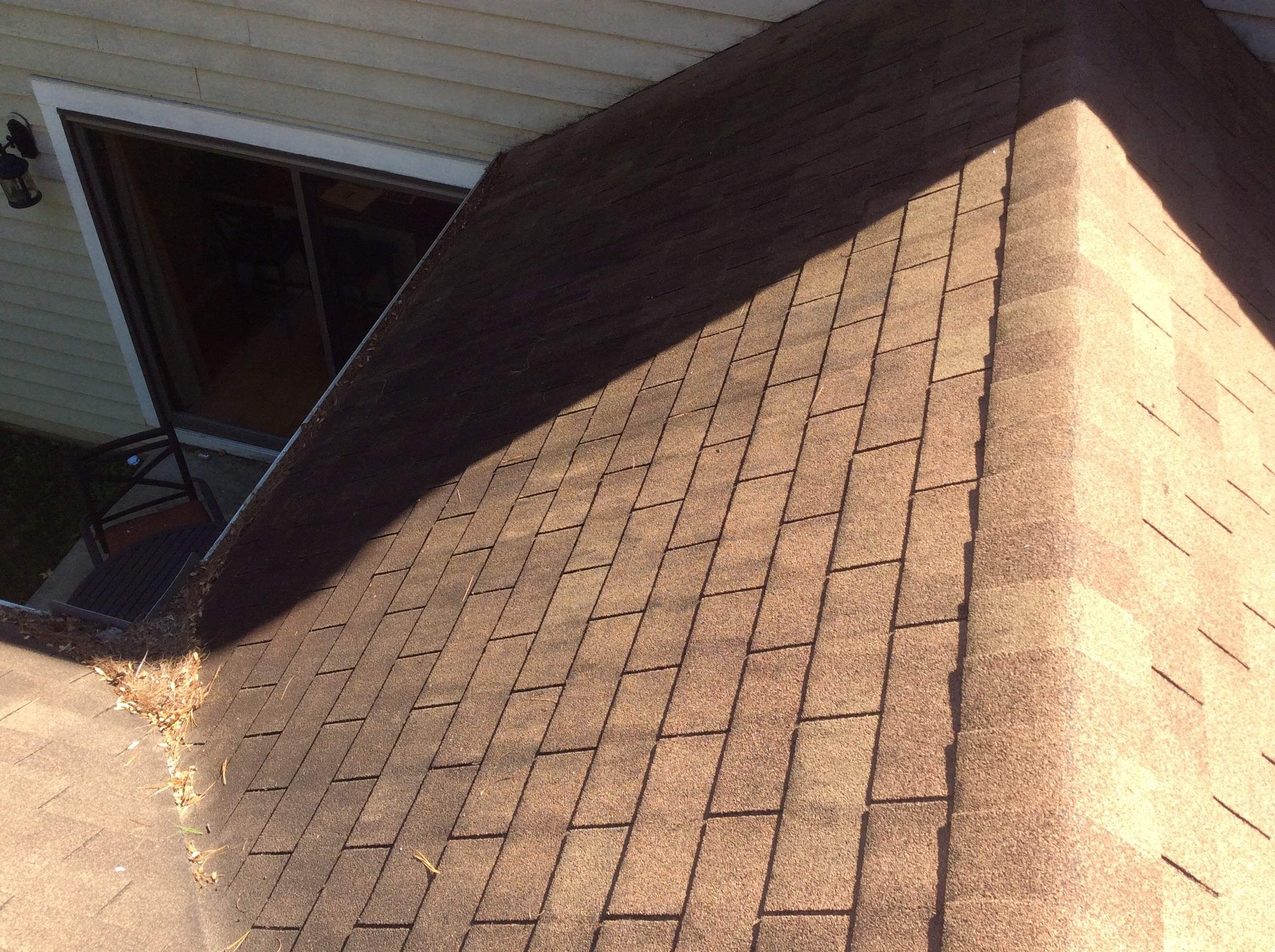 Residential Roofing Installation using Pewterwood Shingles  by Alpha Design Services