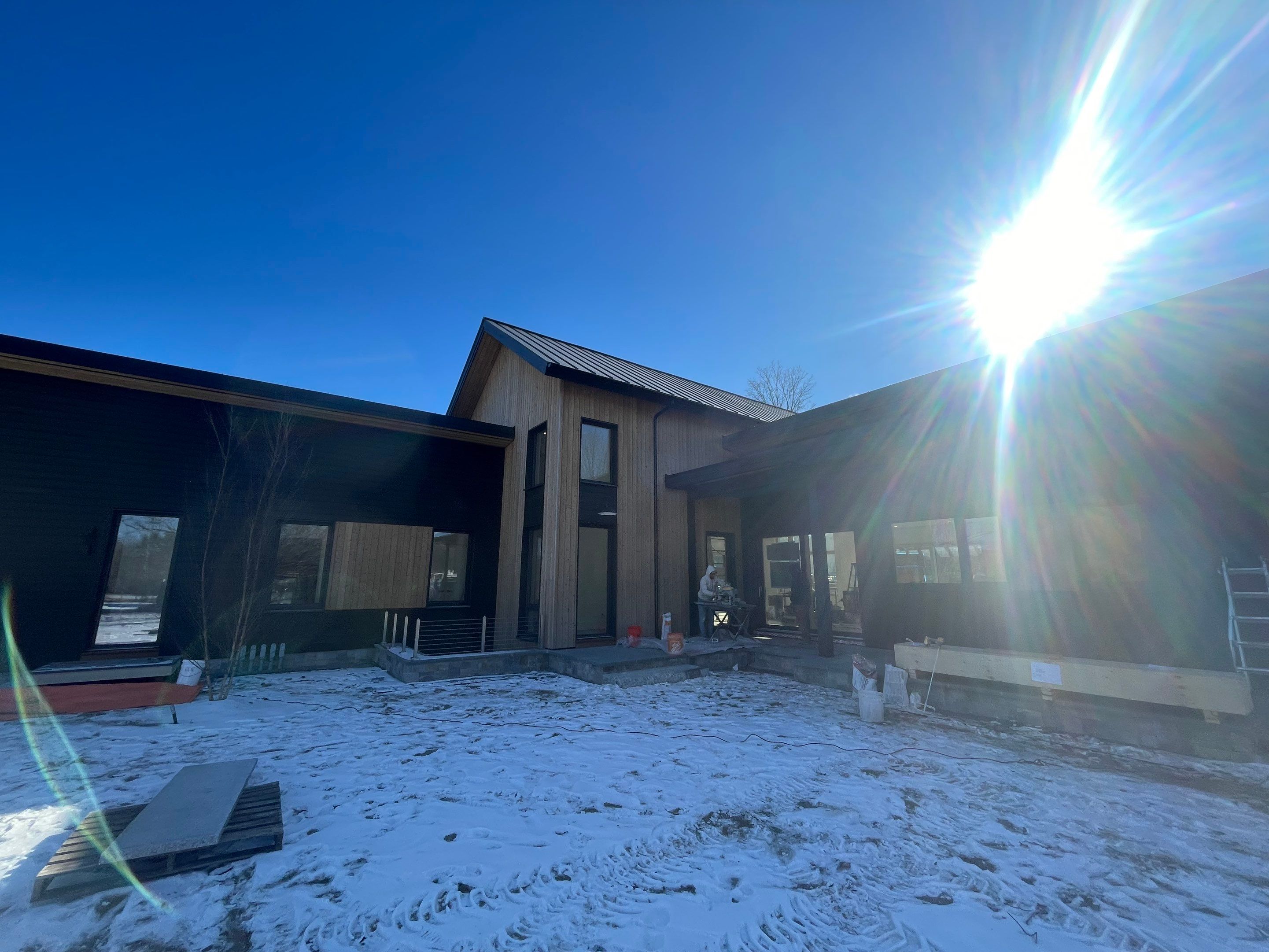Gutter Installation using 6" Half Round Aluminum Gutter with 3" plain round aluminum downspouts and with a vinyl wedge buildout in Stow, MA. by Gutter Pro Enterprises