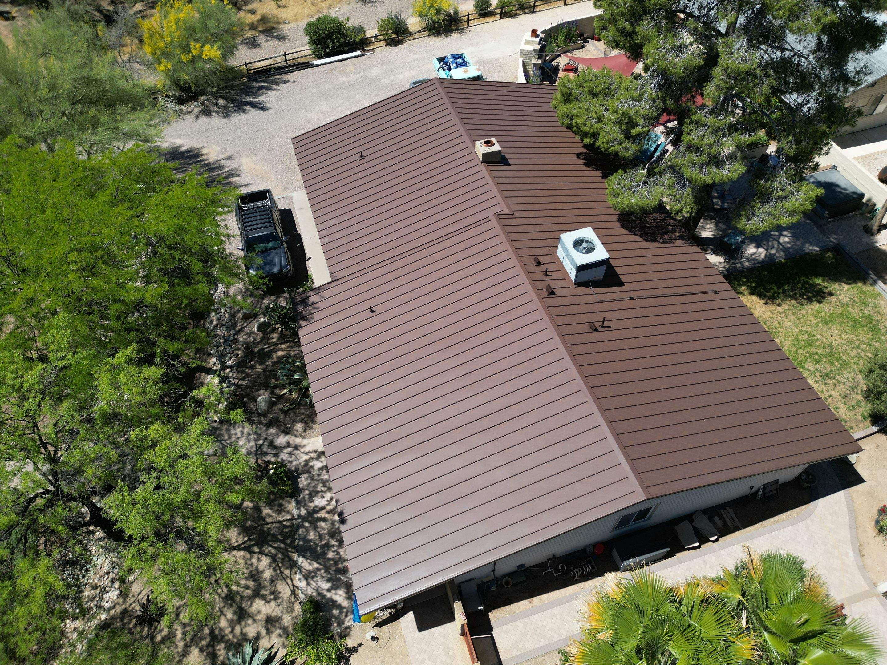 Weathered Rust Standing Seam by Reimagine Roofing