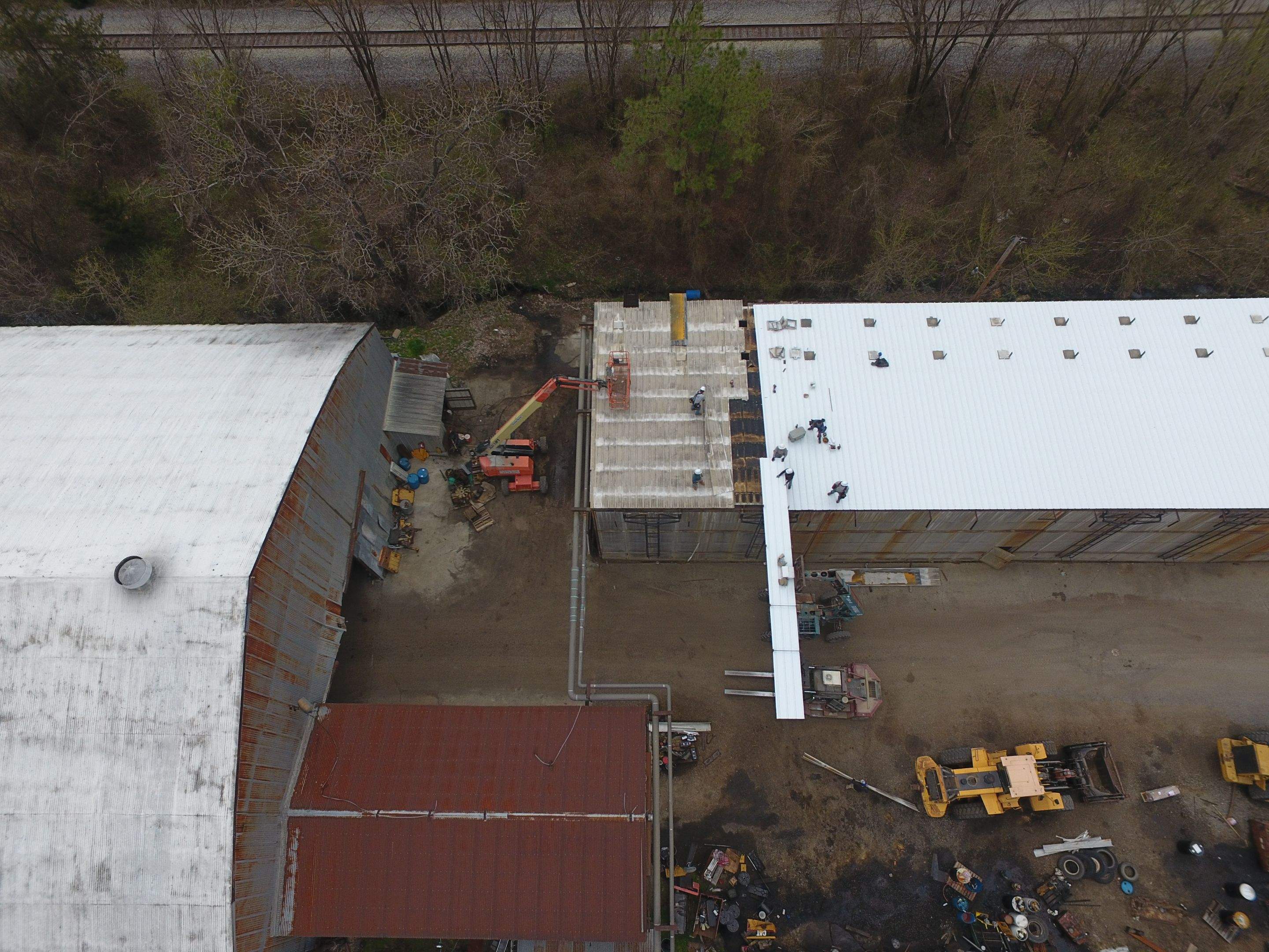 Commercial Roofing Installation using Aluminum Roofing panels by Hostetler Roofing