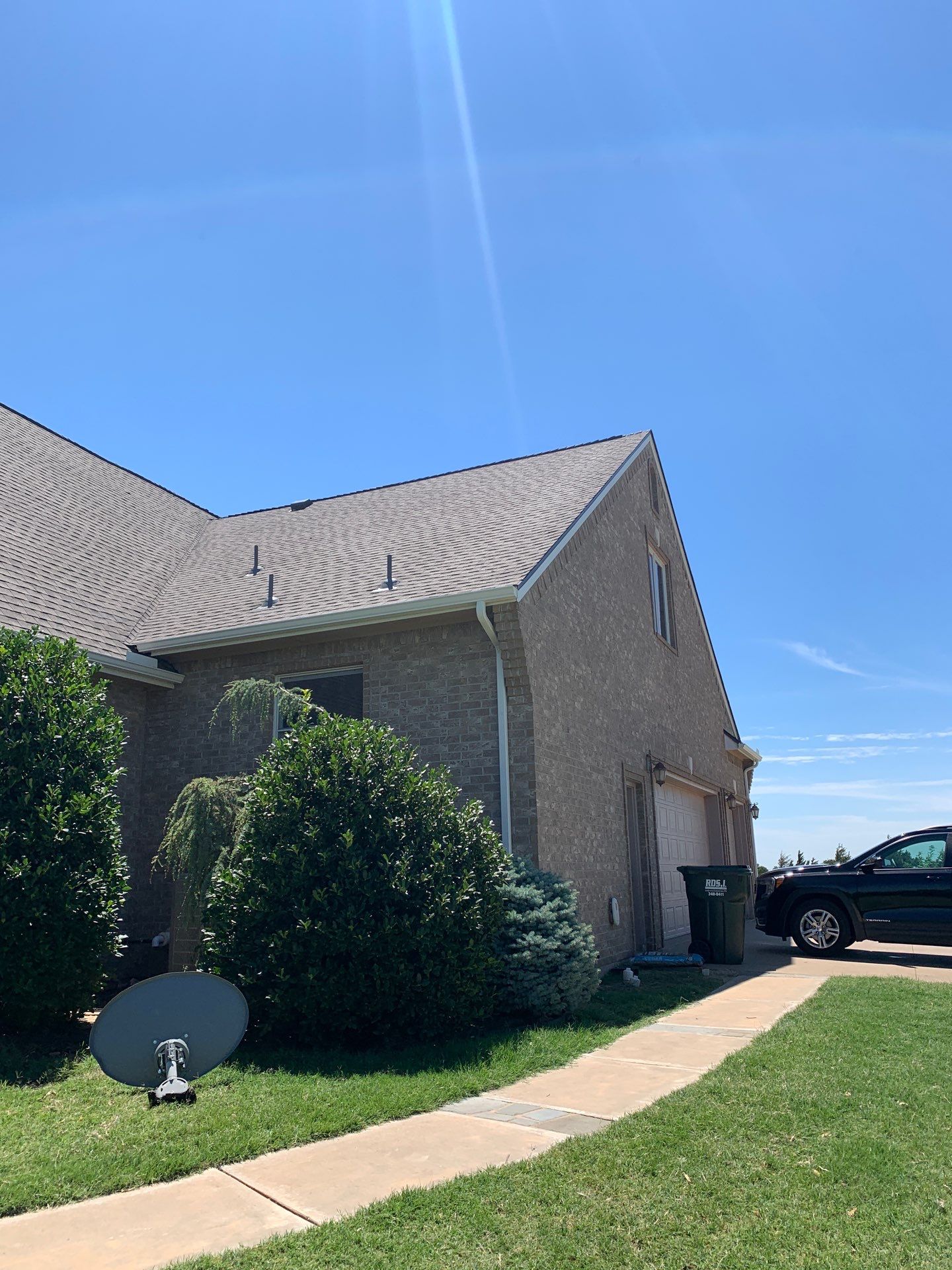 Roof Replacement and Gutter Installation in Edmond, OK by McCann's Roofing and Construction