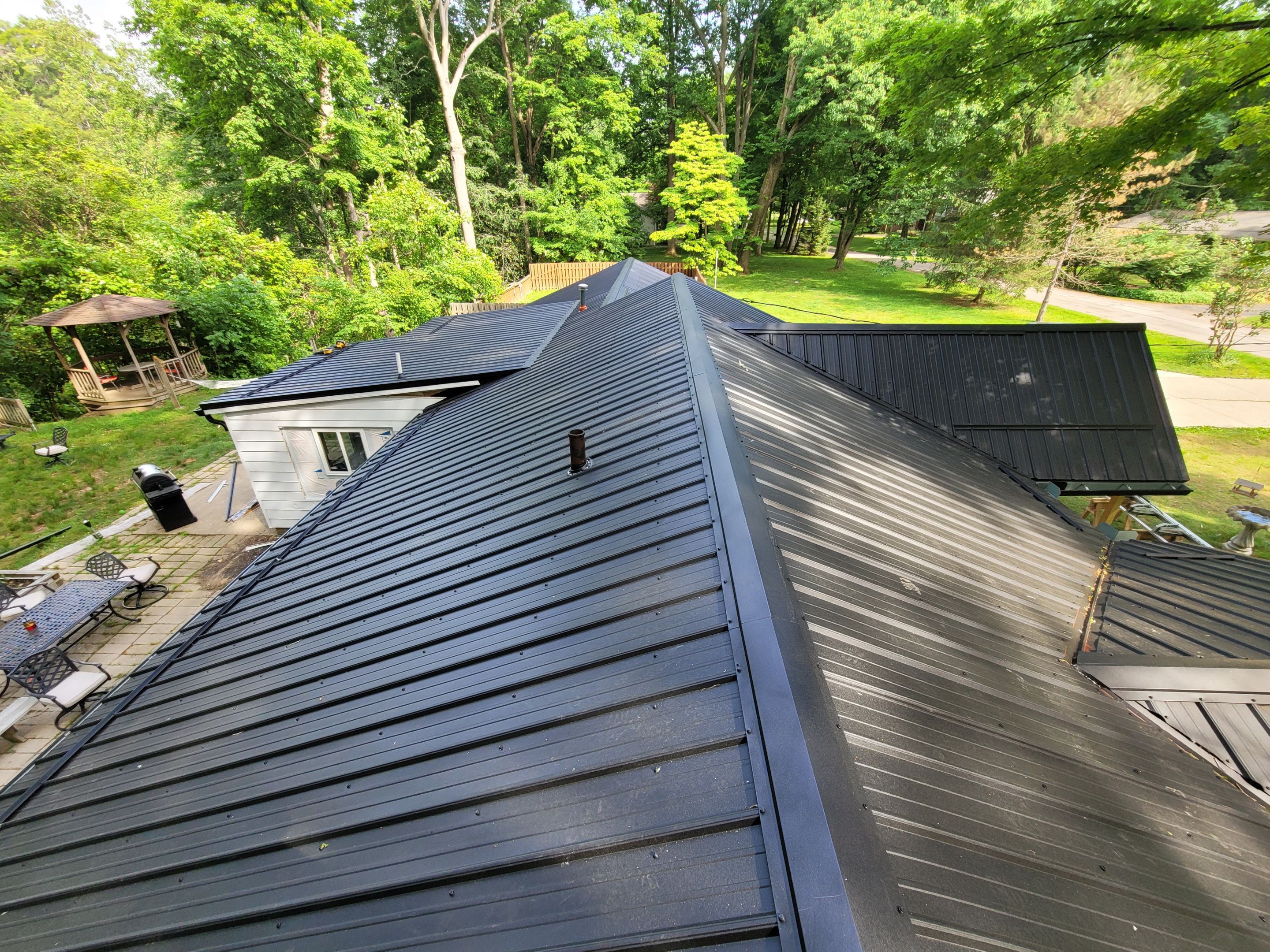 Matte Black Metal Roofing, Matte Black Gutters by Pally Roofing