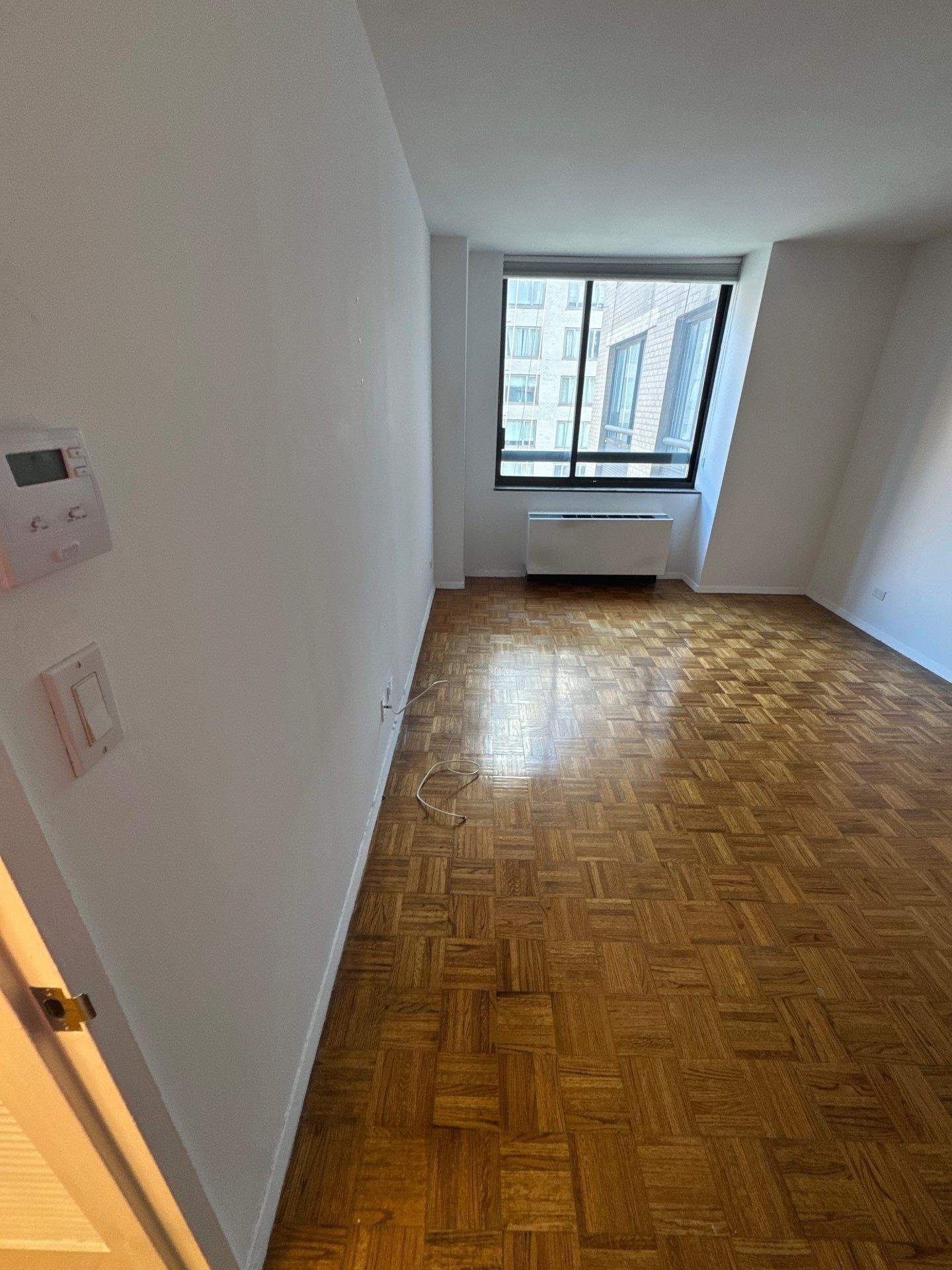 Multi-Unit Water Damage Mitigation and Parquet Floor Restoration in Manhattan by FLAPA & KeyStone
