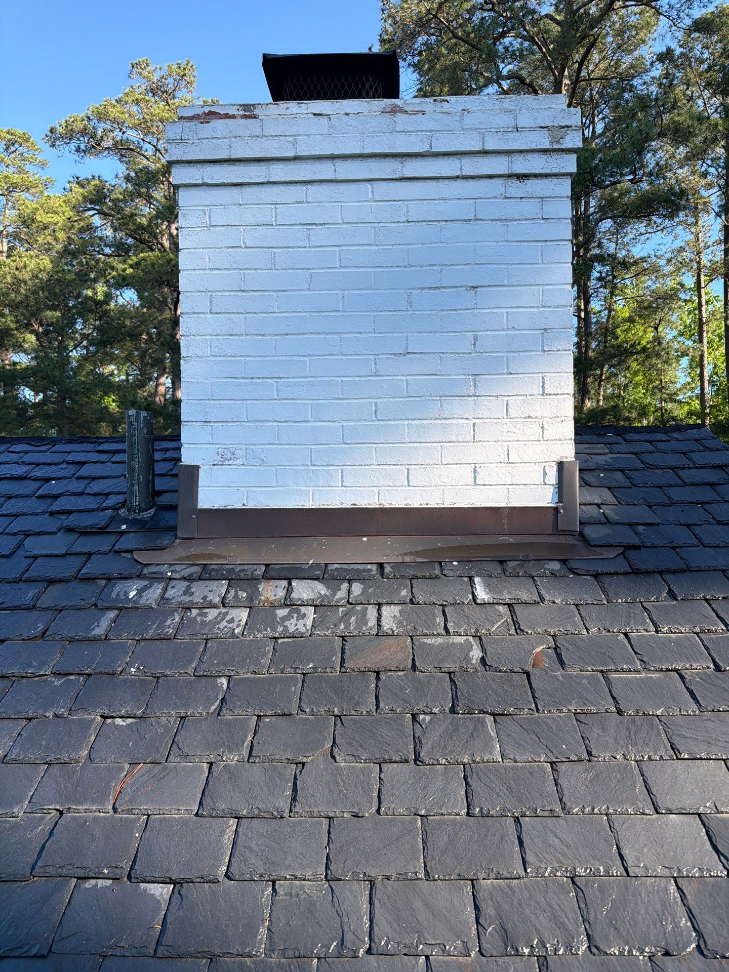 Historical Slate Roof Repair and Chimney Flashing Restoration in West Point by Cade Construction
