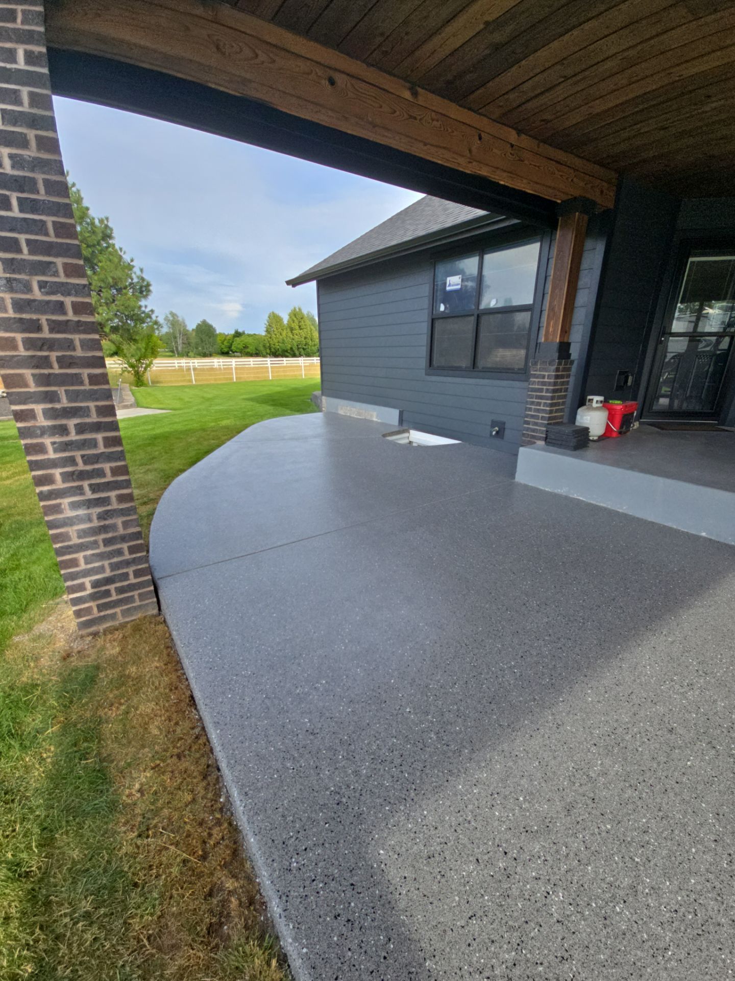 Slate Hybrid Concrete Patio and Apron Coating in Post Falls by Croc Coatings, LLC