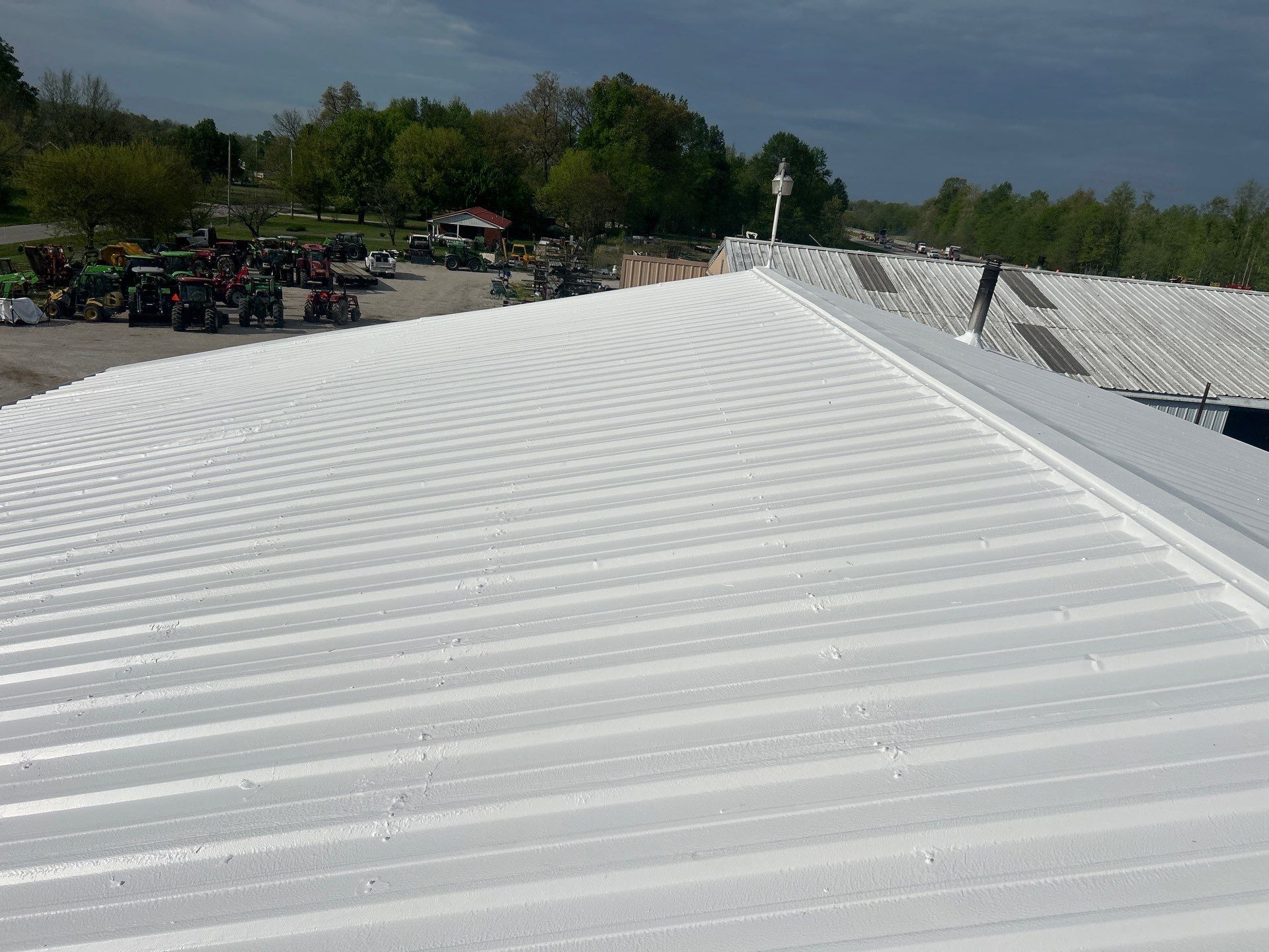 Commercial Metal Roofing Restoration using Coatings by Kentucky Commercial Roofing