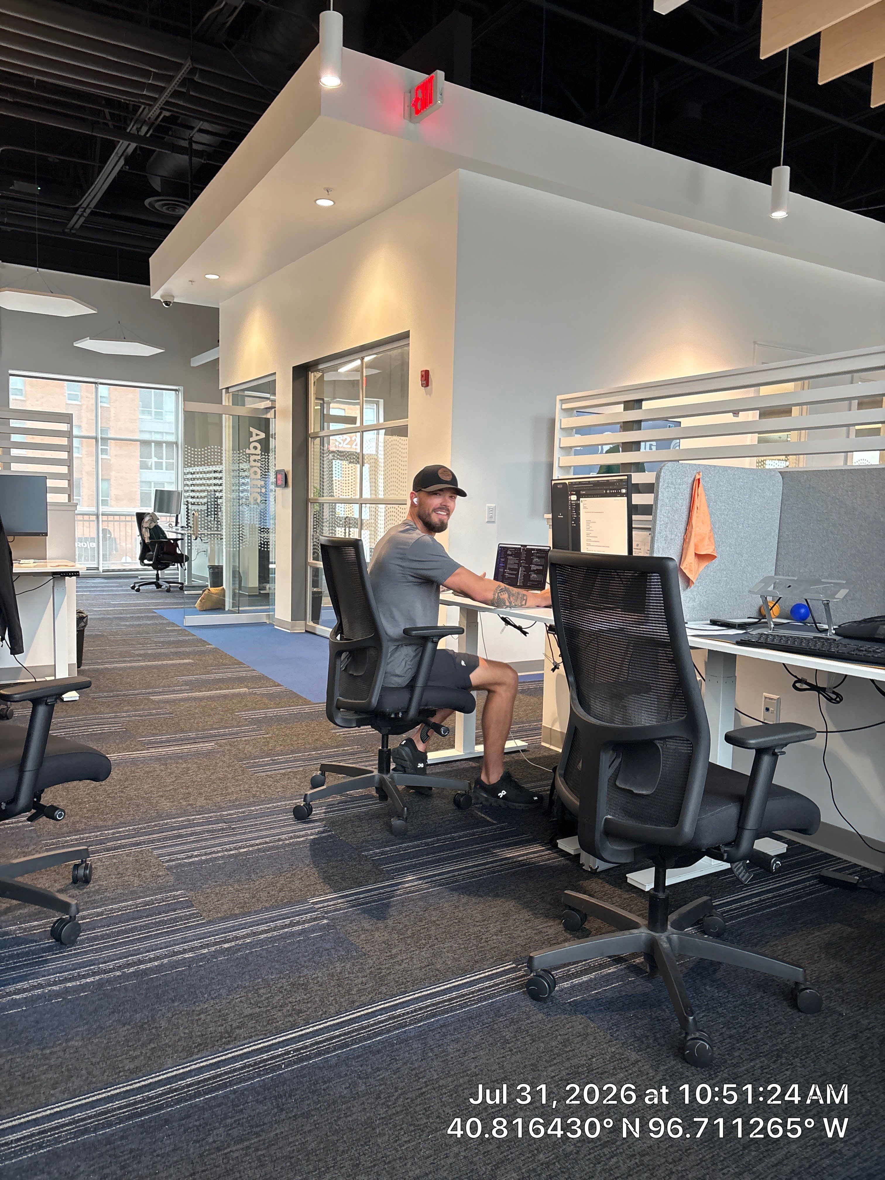 Modern Open-Plan Office Remodel with Acoustic Ceiling Baffles by CompanyCam Sales Demo
