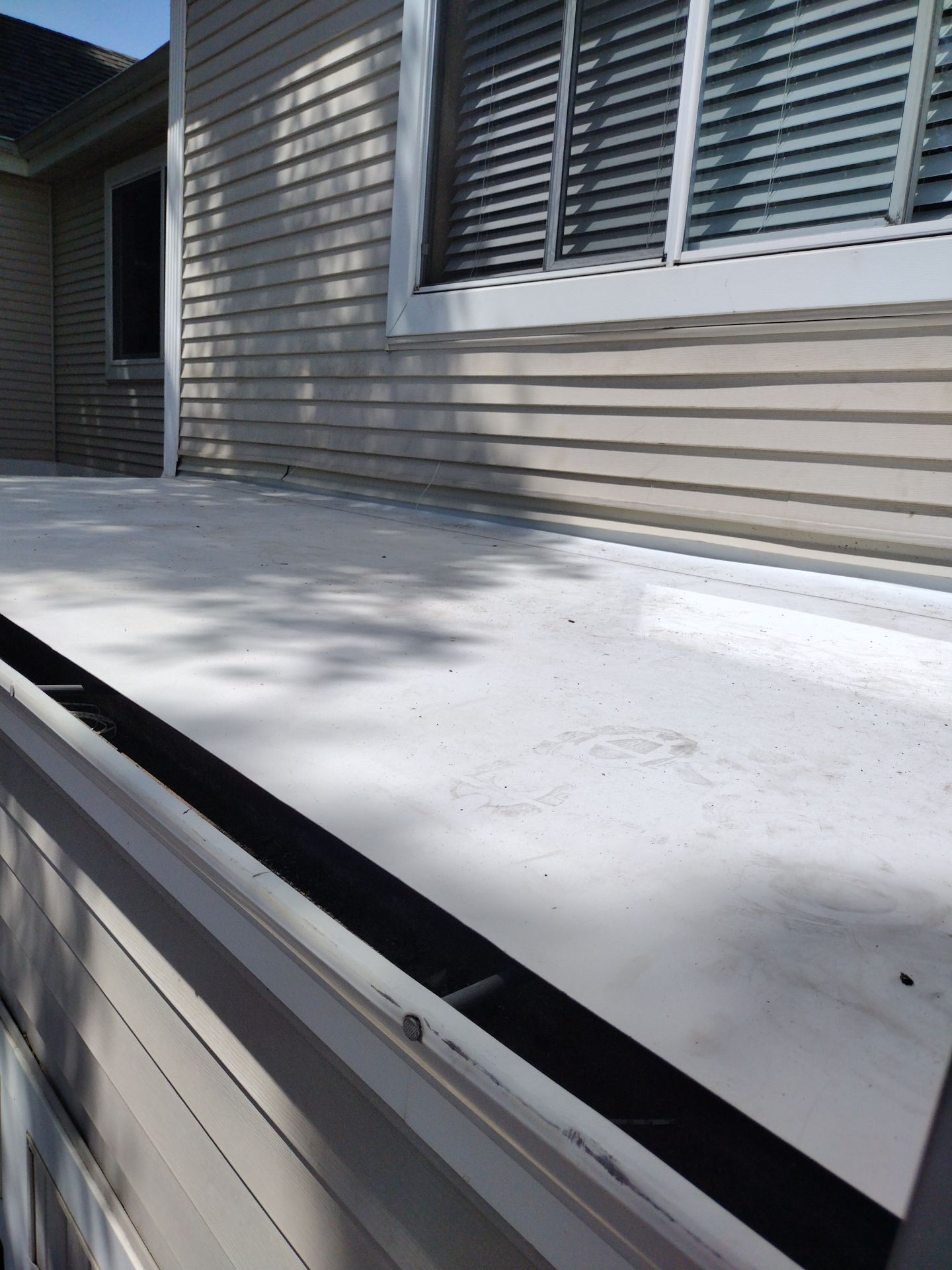 Dec-Tec Walkable Membrane using Dec-Tec (Color: Granite) by Orezona Building & Roofing Company, Inc.