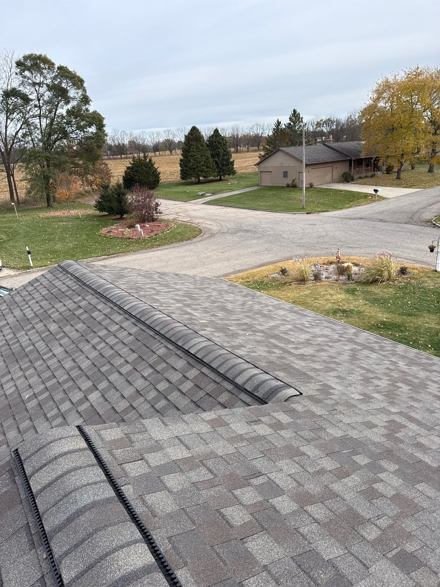 Weathered Wood Roof and Egress Window by 42 North Construction, LLC.