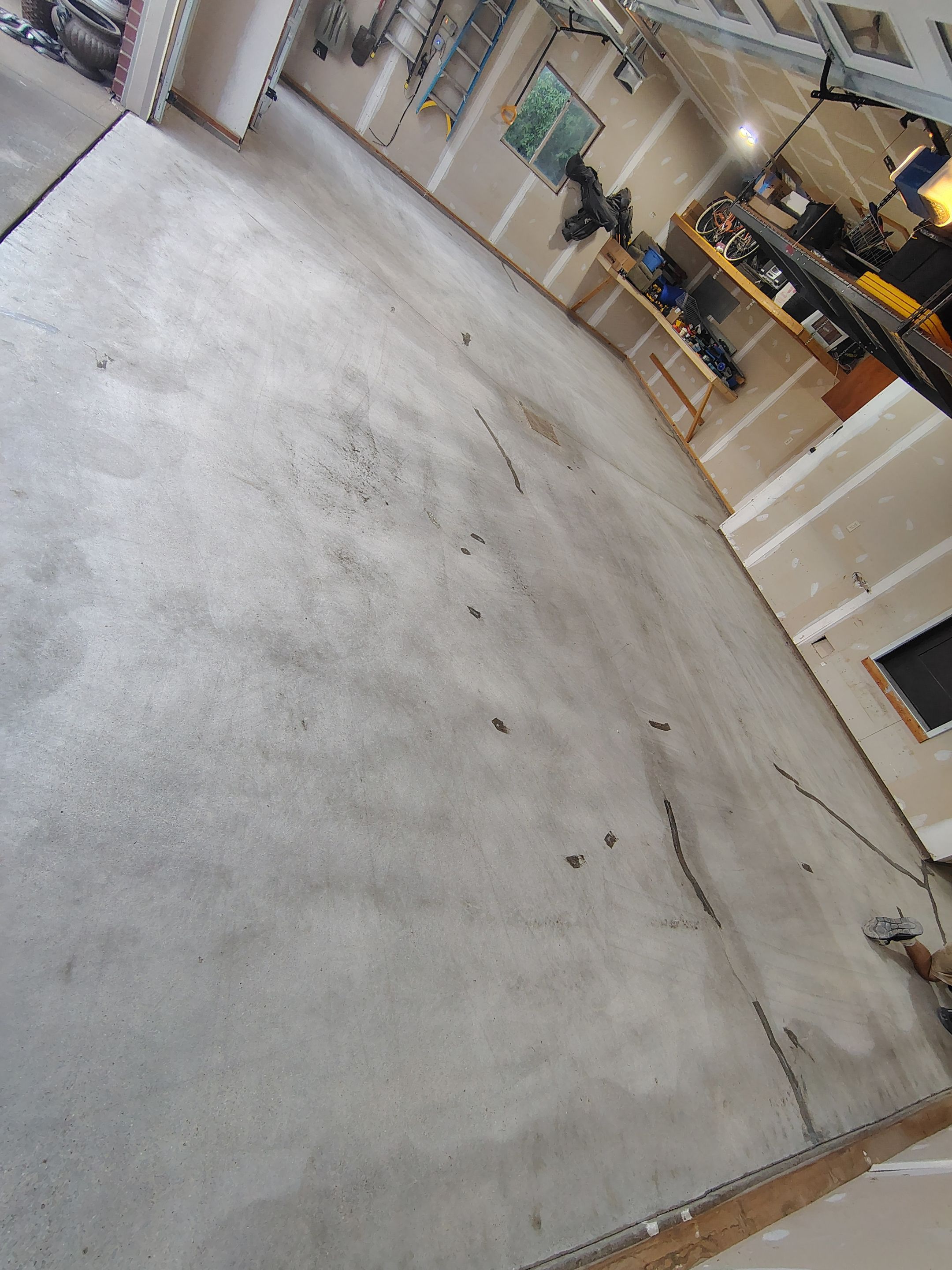 Sioux Falls Garage Concrete Grinding and Nightfall Decorative Chip Coating by Select Painting, Coatings & Garage Cabinets