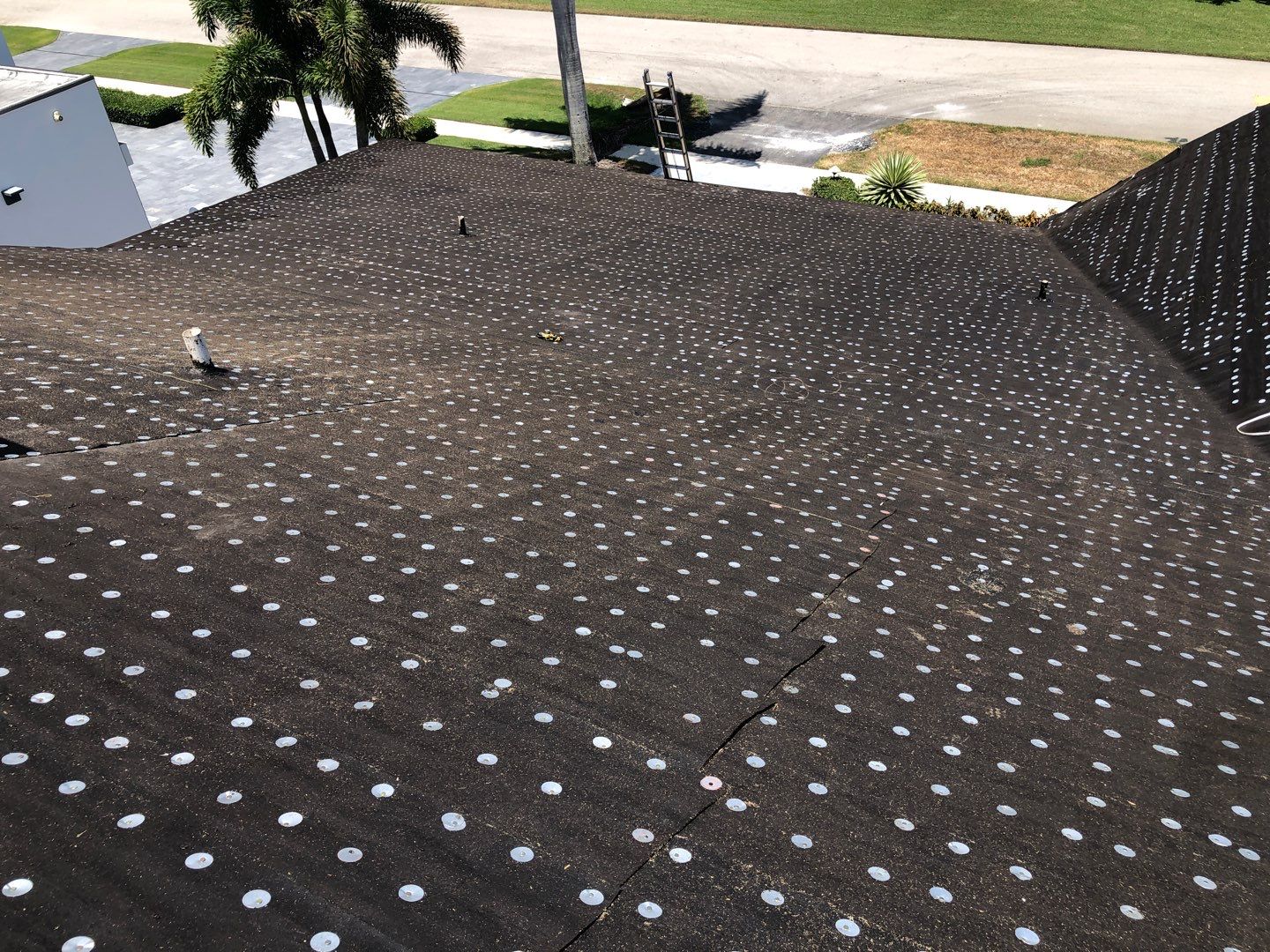 Residential Roofing Installation using 1" Nail strip metal roof by BLUES BROTHERS ROOFING
