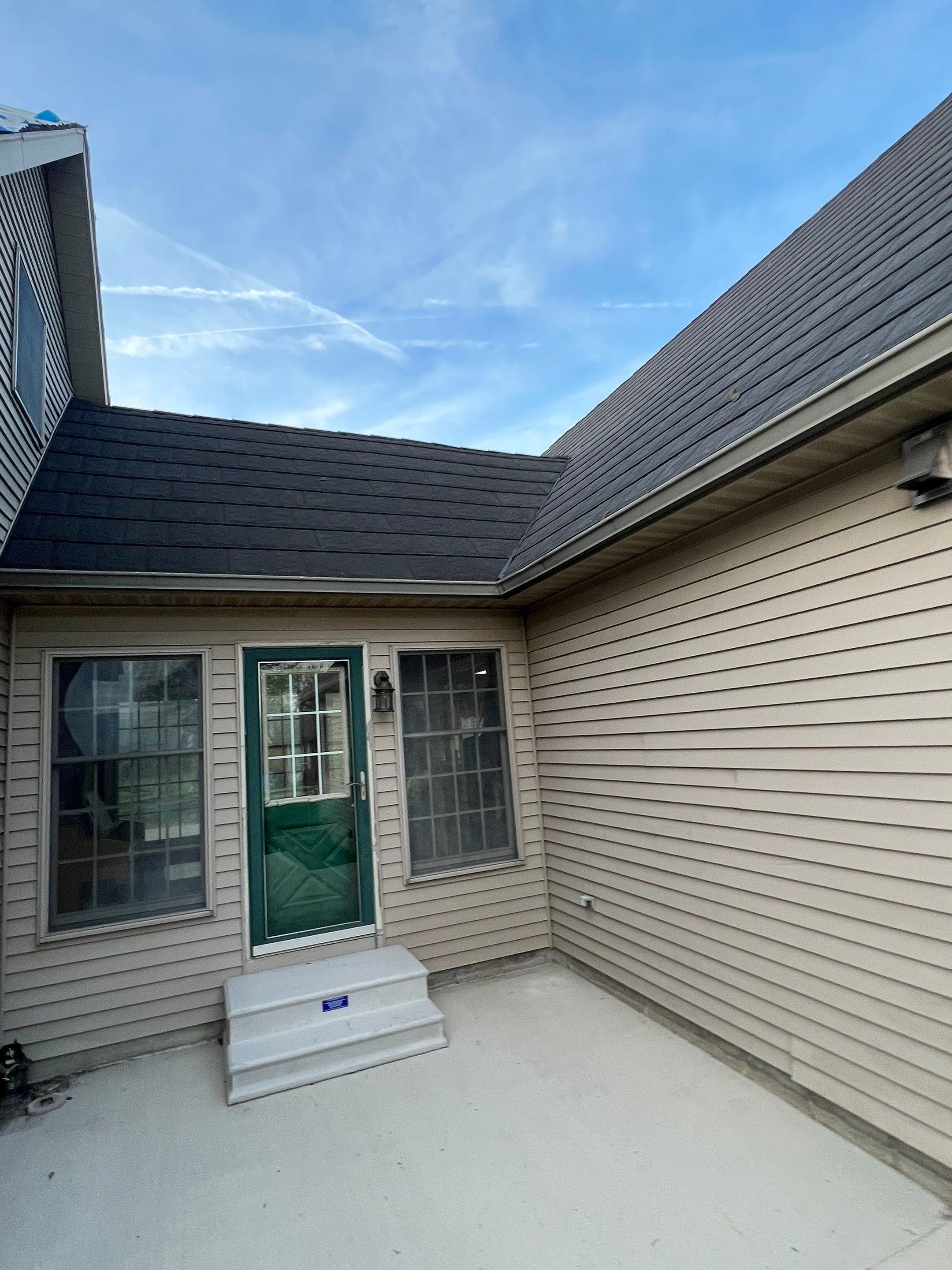 Residential Roofing Repair using Metstar Stone Coated Charcoal by Nitro Roofing and Construction