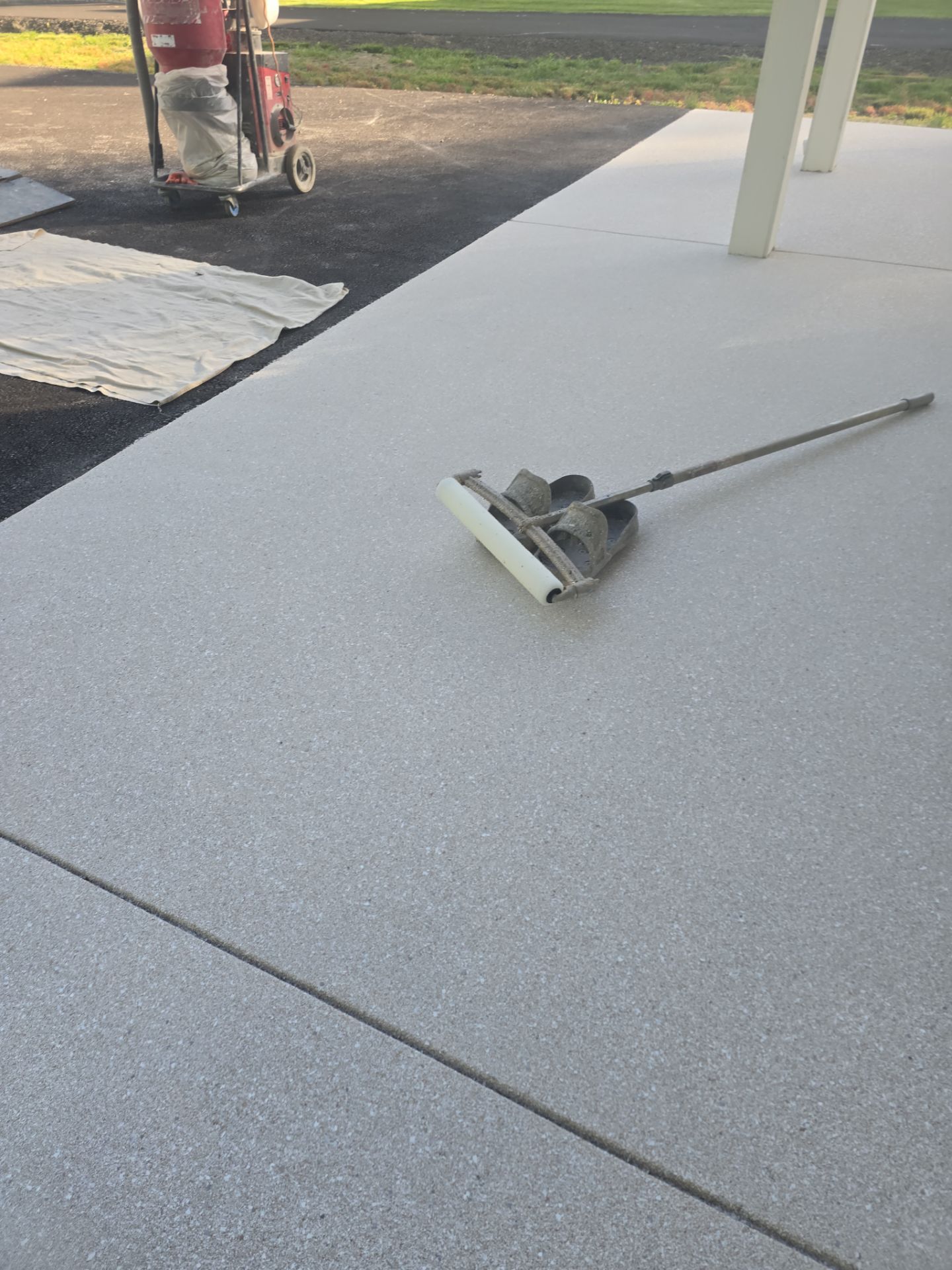 Patio Transformation with Sandstone Penntek Flooring by Croc Coatings, LLC