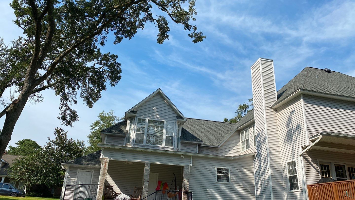 Residential Roofing Installation using Roof Replacement by American Roofing & Construction LLC