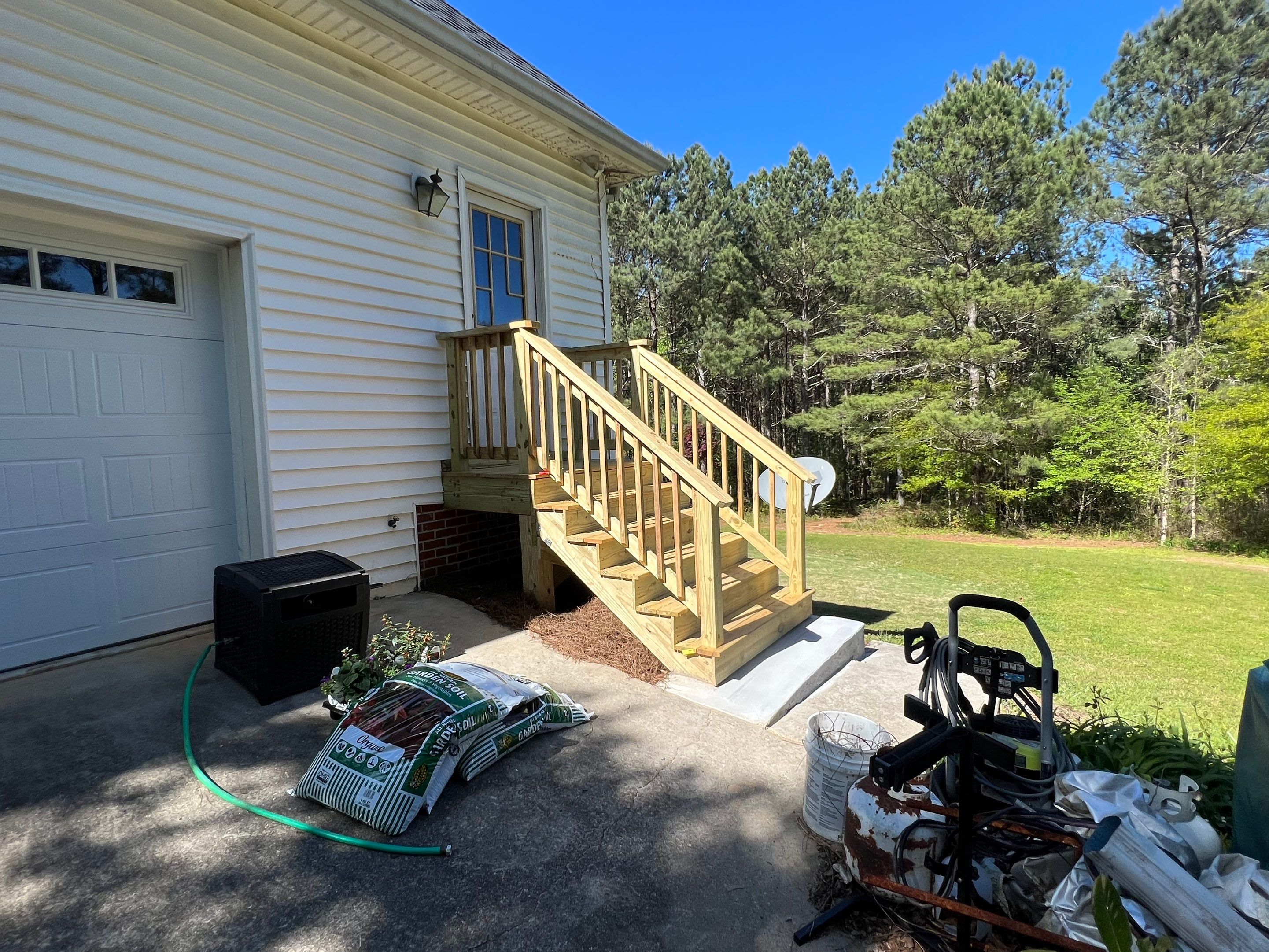 Pressure-Treated Wood Deck and Side Porch Replacement in Dacula by Swift Home Renovations