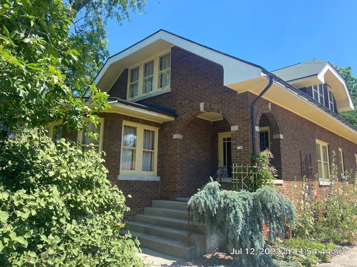 Asphalt Shingle Replacement and Half Round Copper Gutters Installation by Custom Installations, Inc.