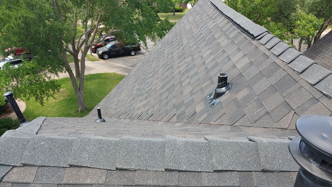 Austin Residential Roof Replacement Featuring IKO Glacier Architectural Shingles by Caliber Restoration LLC
