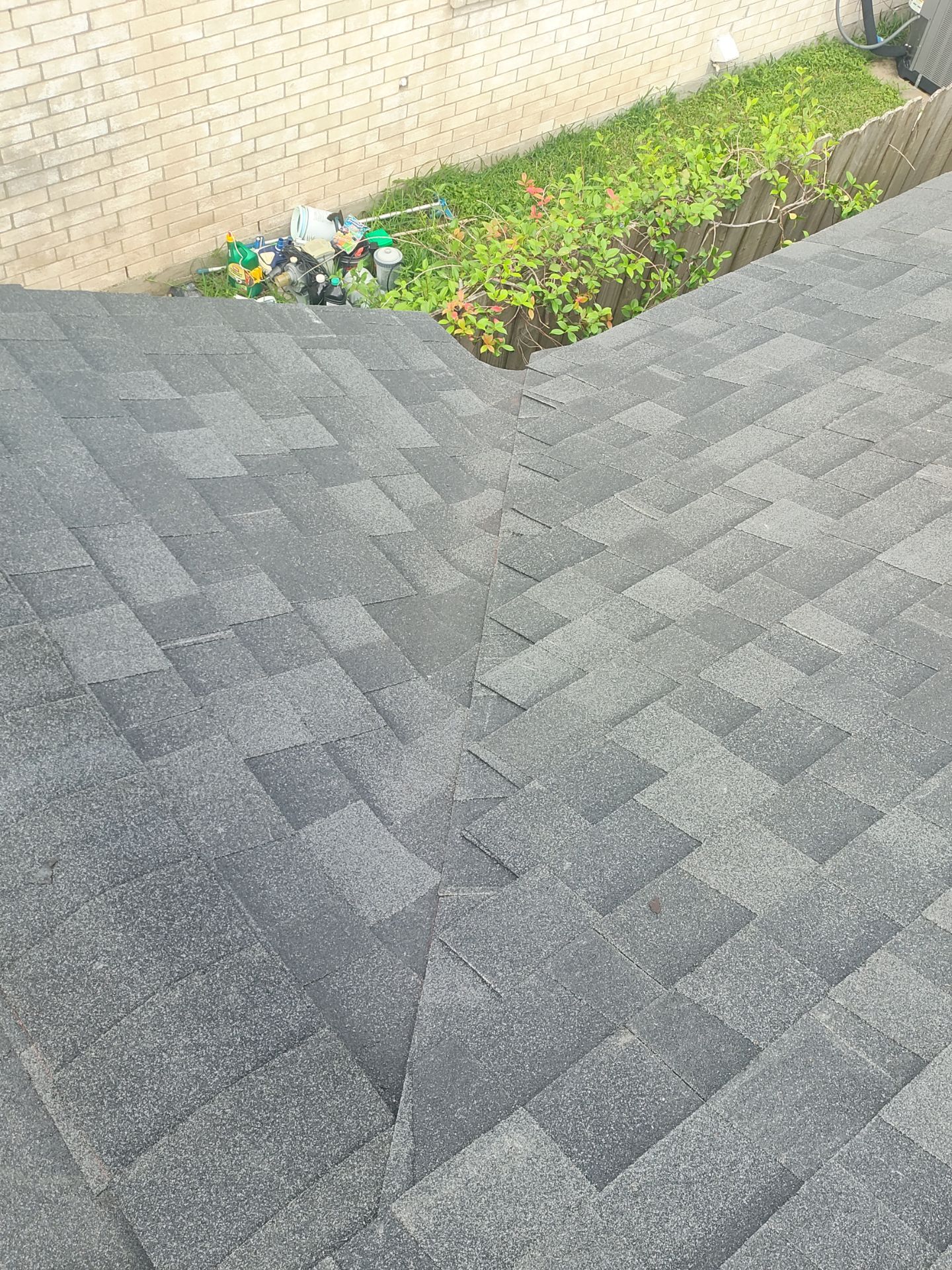 Nothing looks nicer than a little black roof by Bayfront Roofing and Construction