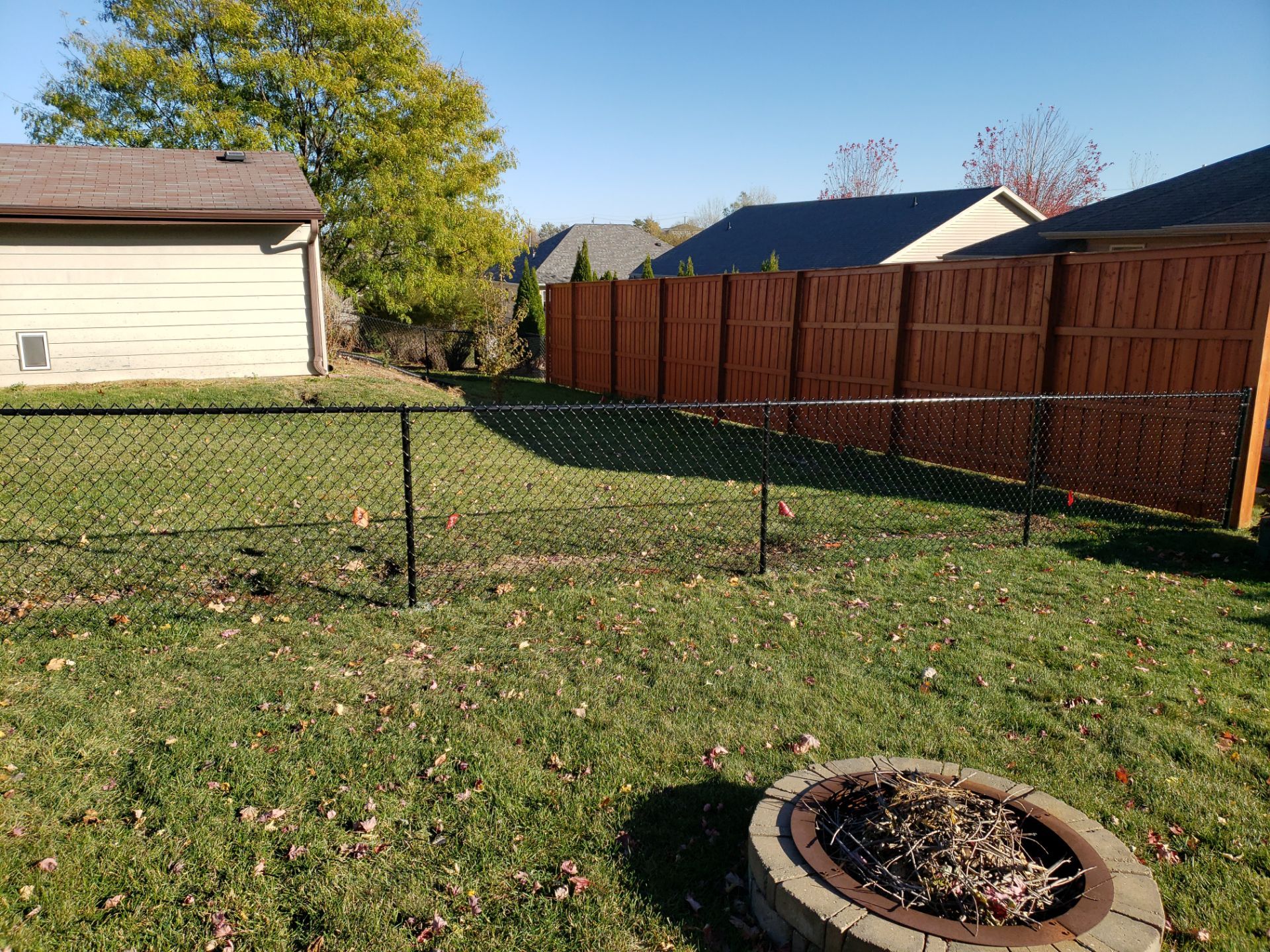 Black Chain Link Fence and Gate Installation in Cedar Falls by Perfect Picket Fence and Stain