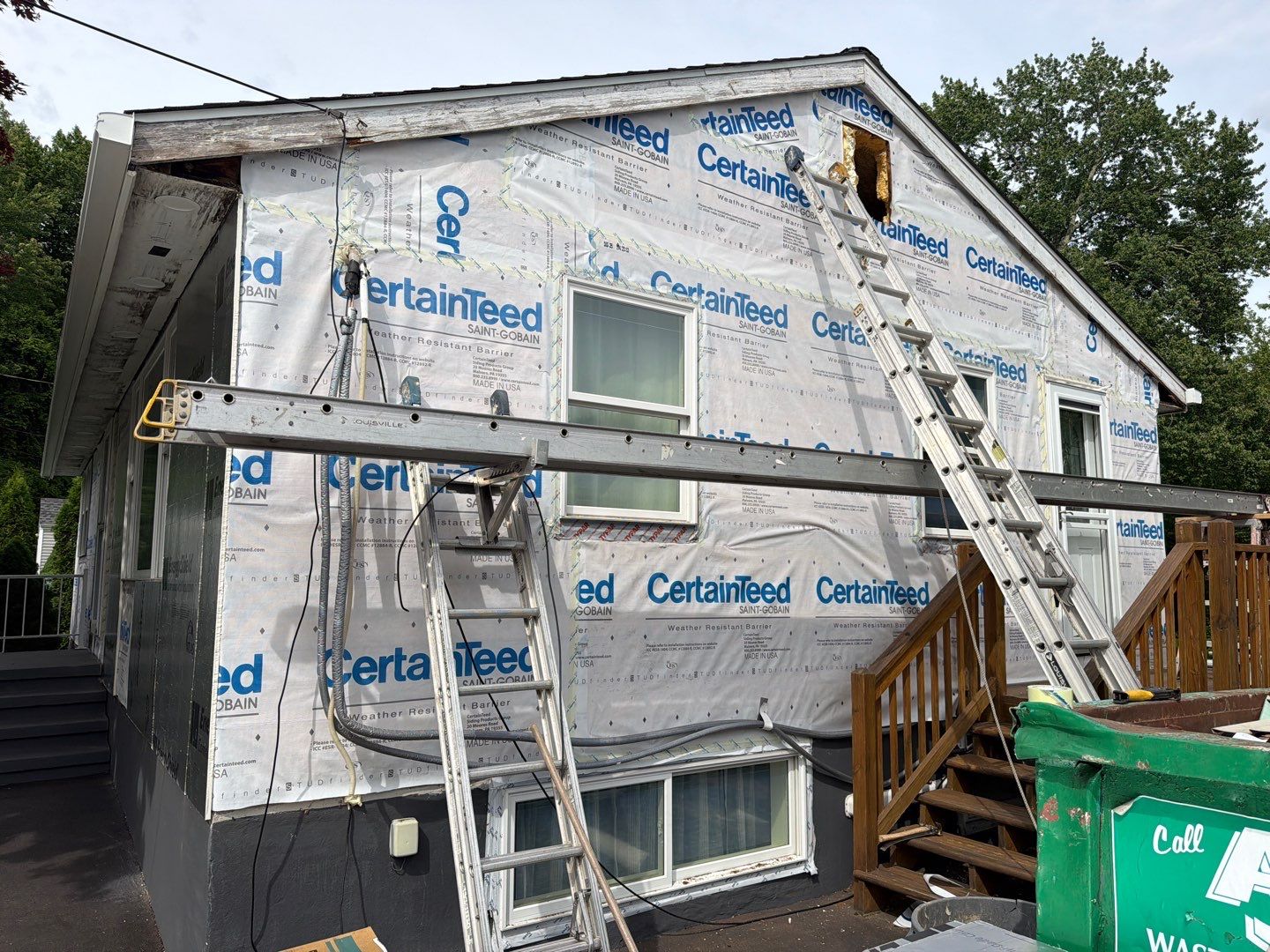 Siding Renewal with Cert Monogram D/4x12'6" clapboard Slate & Cert. Monogram D/4x25' clapboard Slate by DiGiorgi Roofing and Siding Inc