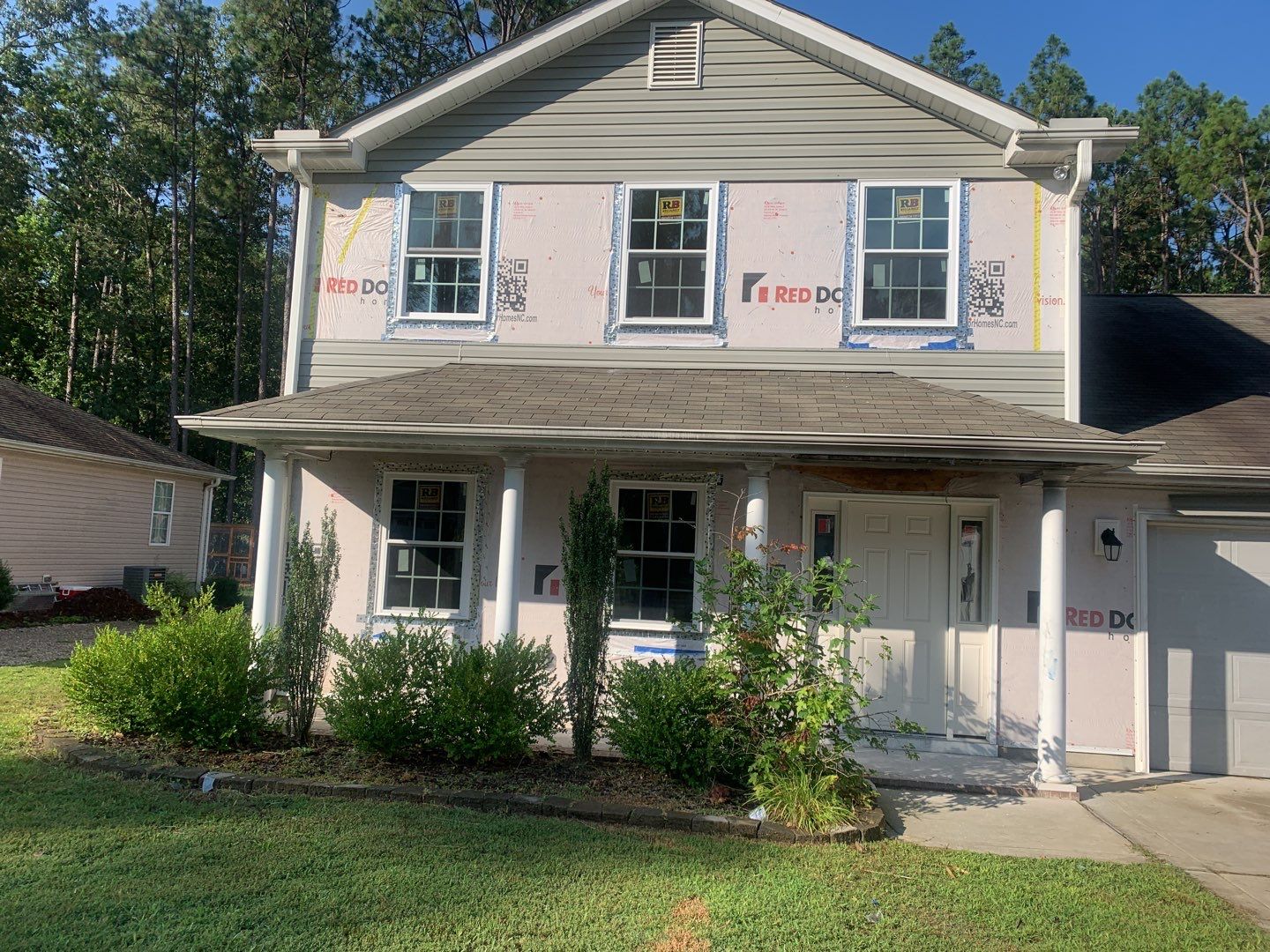 Siding Repair  by American Roofing NC