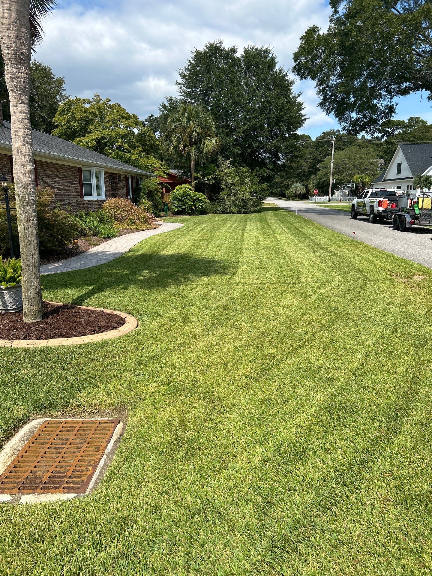 Mow-Mentum Lawn Care Services LLC featured photo.