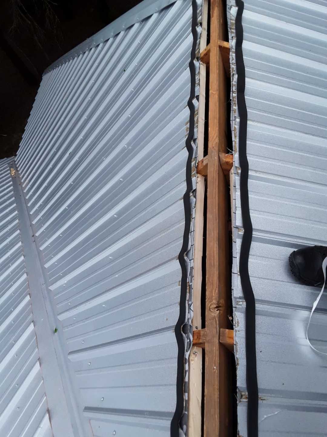 Residential Roofing Installation using Metal roofing by American Roofing & Construction LLC