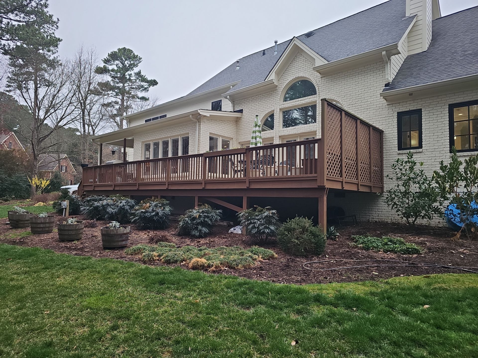 Deck Stain, Round Balusters & Screened Porch Transformation by Billy Weatherspoon Contractor