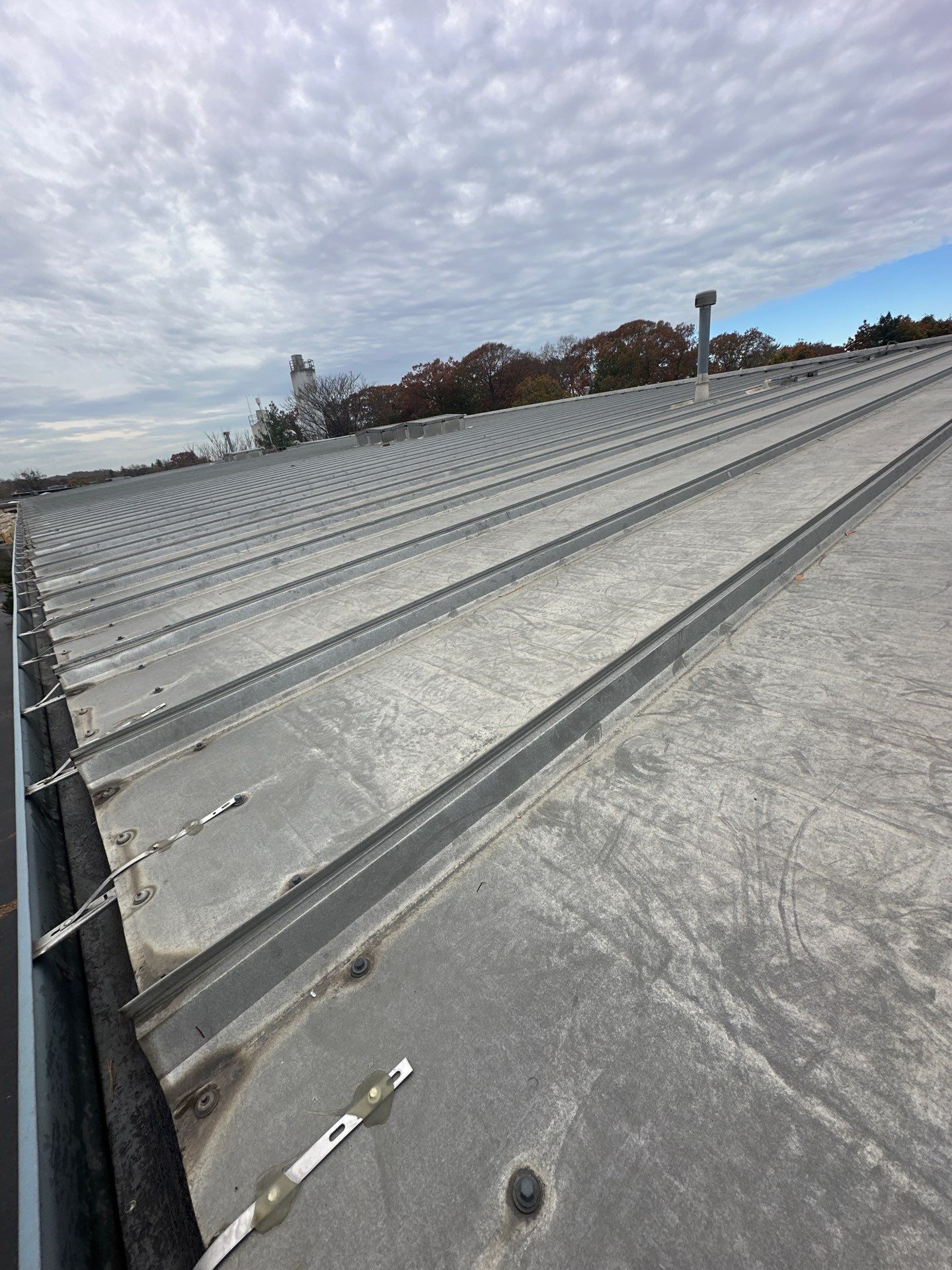 Commercial Roof and Gutter Cleaning  using Gutter and roof cleaning supplies by Above All Gutters 