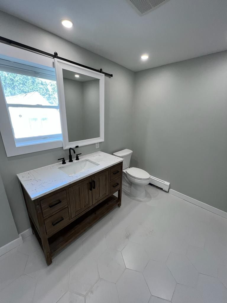 Kids bathroom Upgrade by Cedar Contractors Group, Inc.