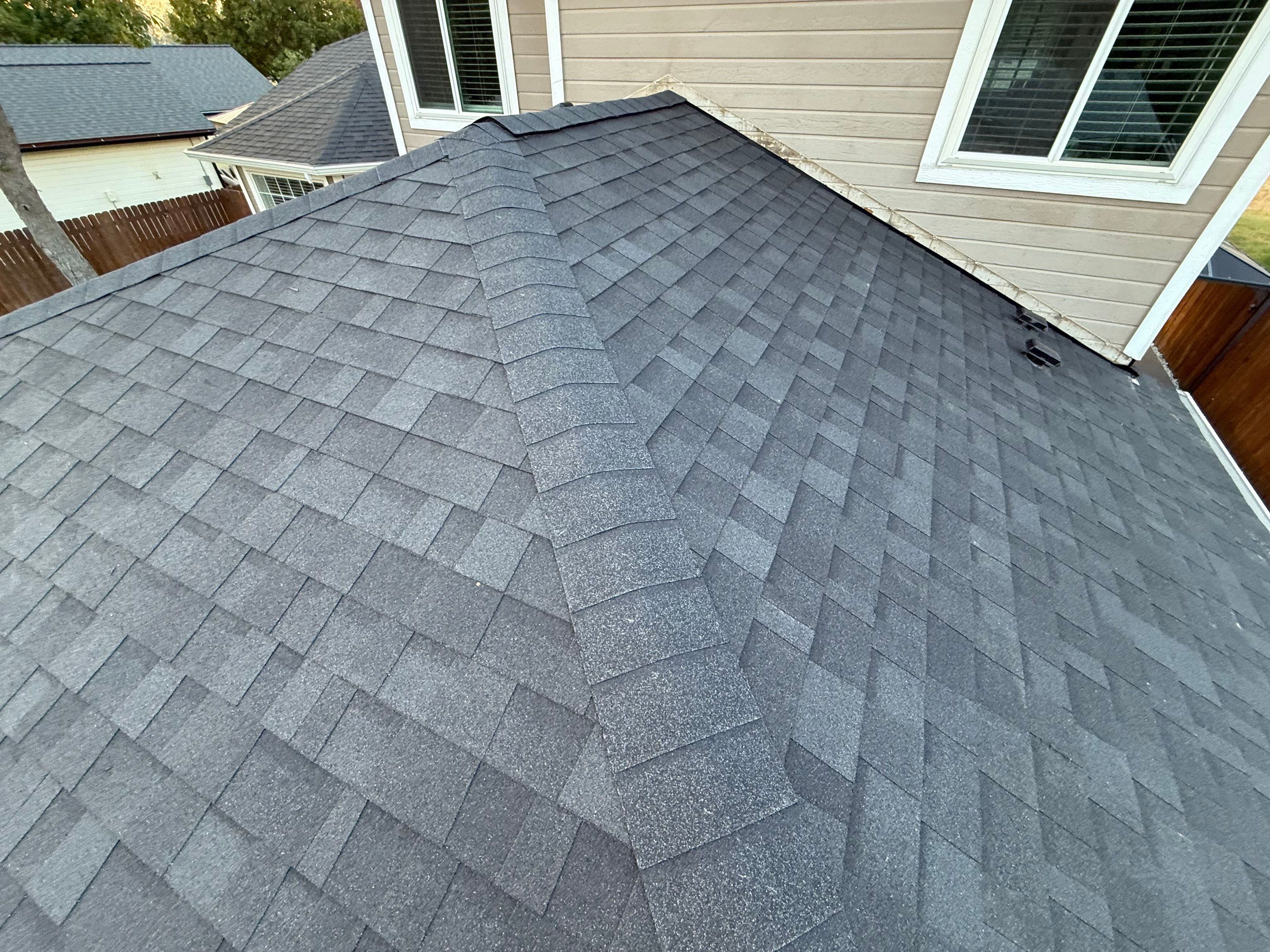 Residential Roof Replacement and Seamless Gutter Installation in Boise by Olive Roofing