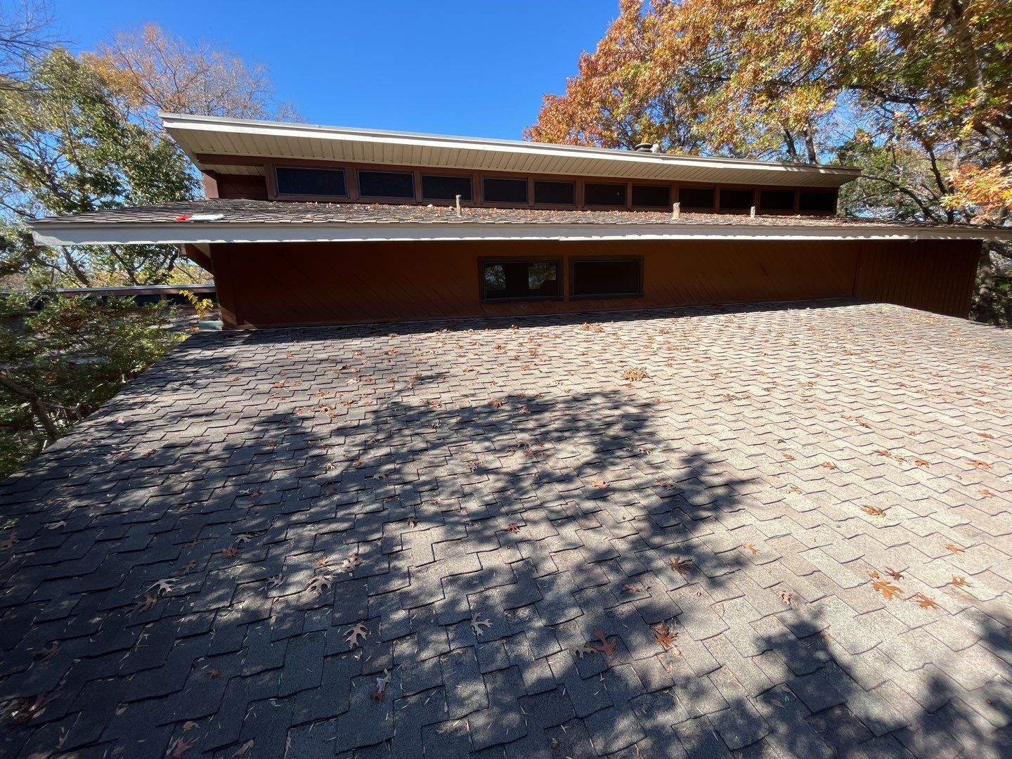 Residential Roofing Installation using Standing Seam Metal Roofing and Composition Shingles by Rainy Day Restoration