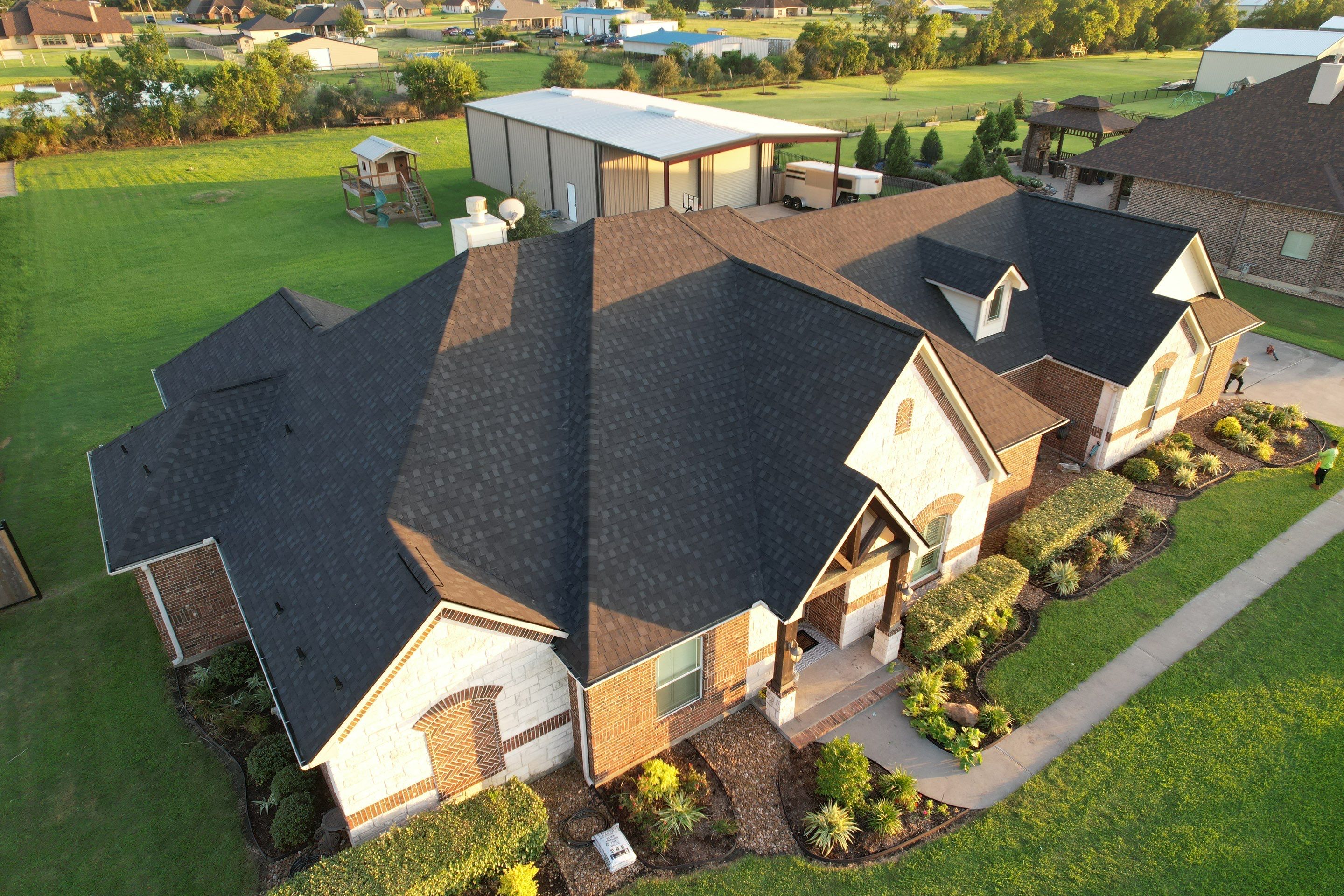 TAMKO Titan XT Rustic Black by STX Roofing