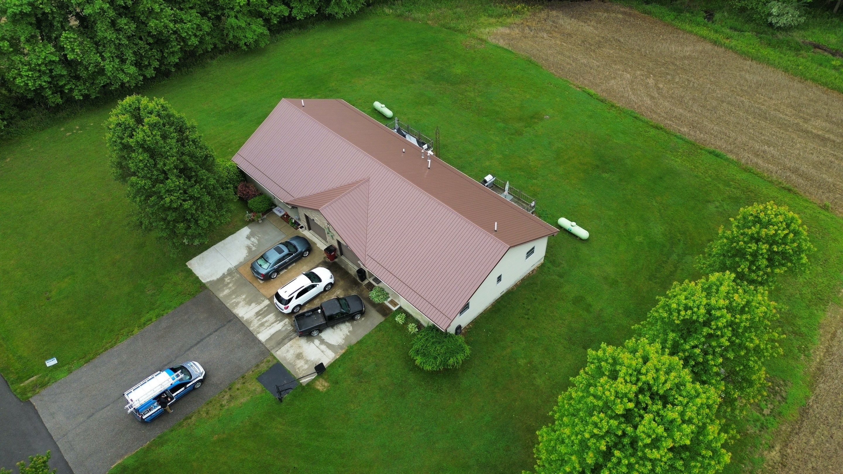Residential Roofing Installation using Performance Panel Metal - Coca Brown by RoofX 
