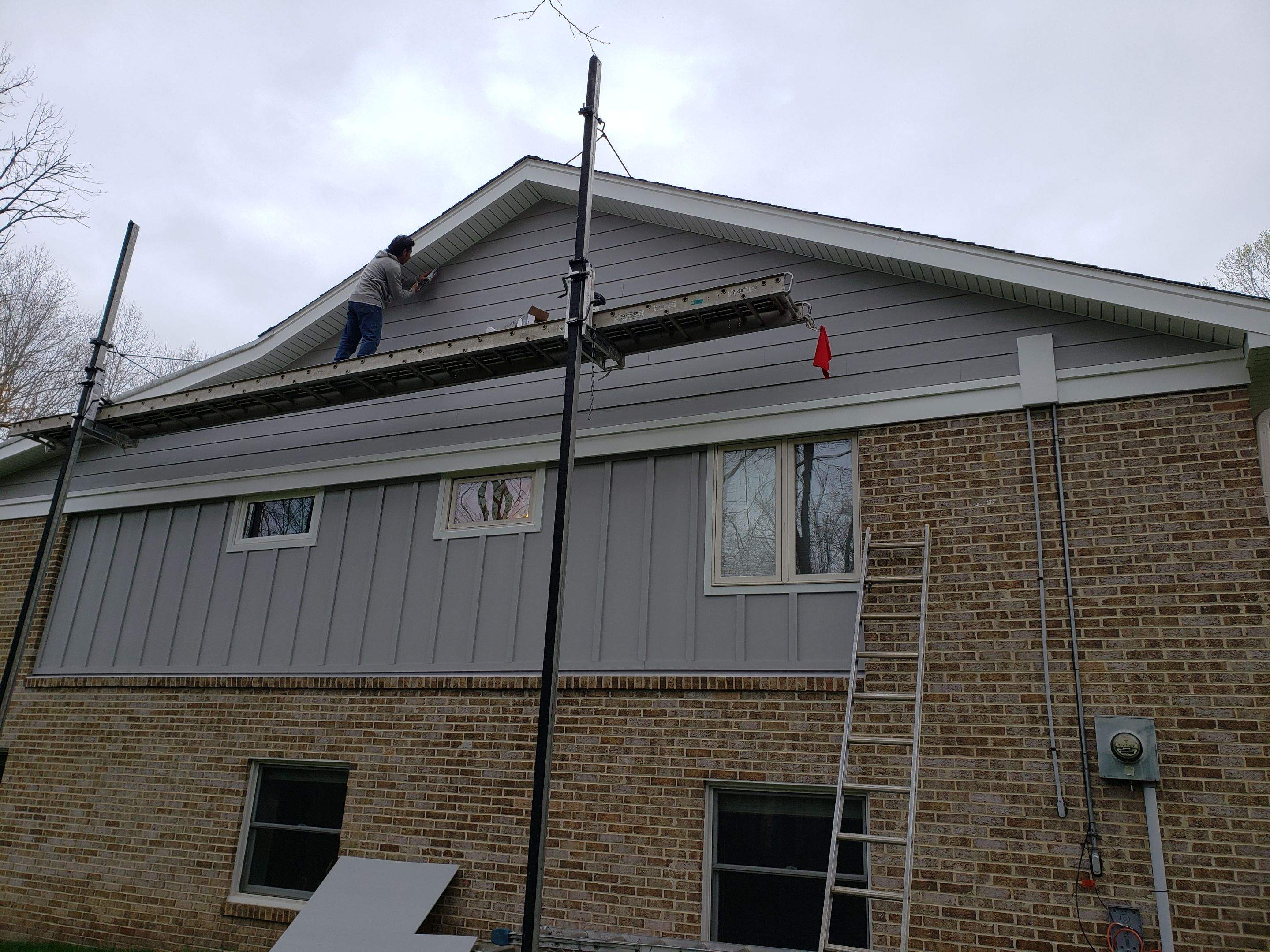 Roof, Siding, Door, and gutter replacement by American Home Contractors